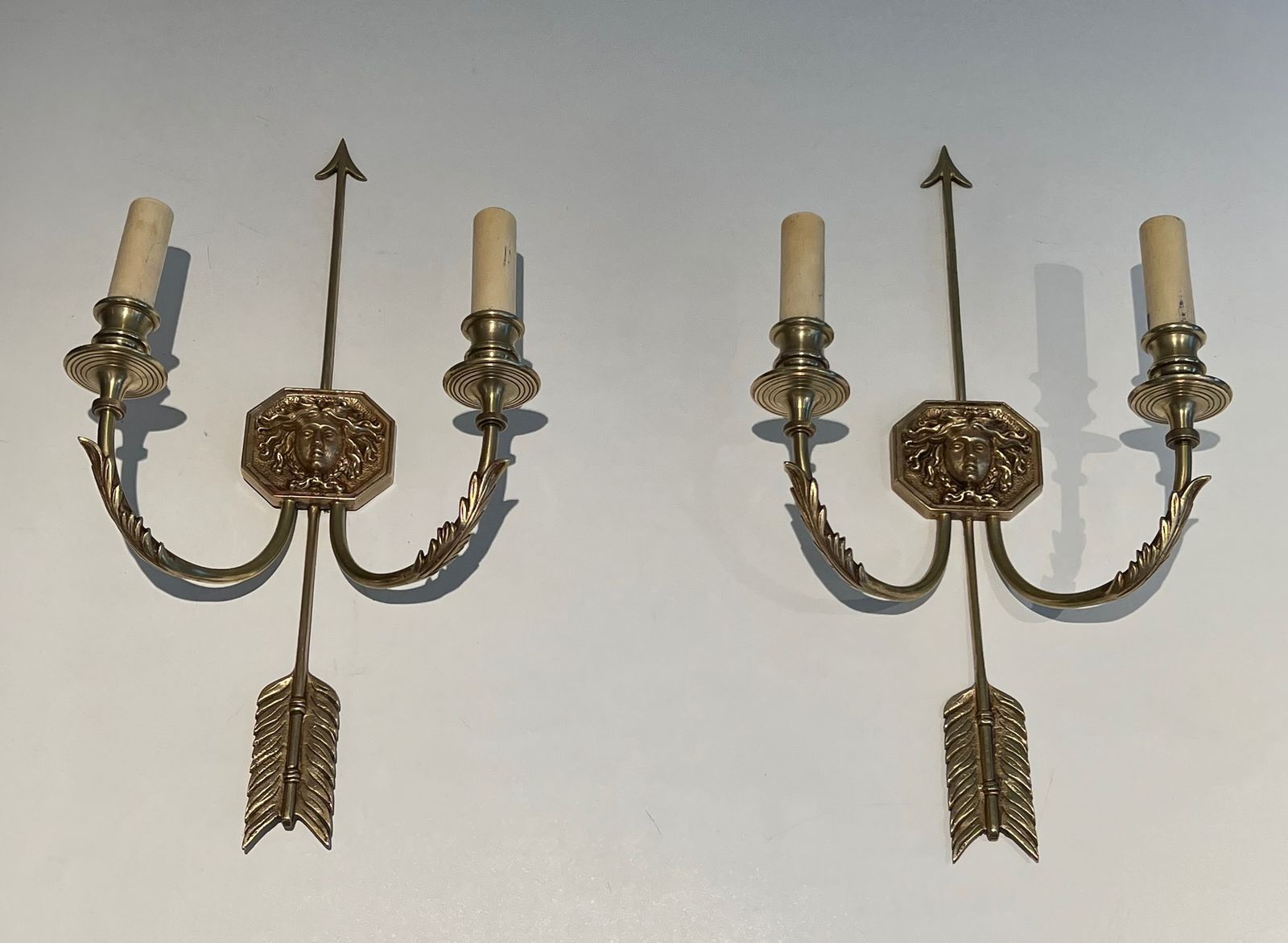 Pair Of Bronze Wall Lights With Arrows And The Effigy Of The Sun King By Louis Gau photo furniture