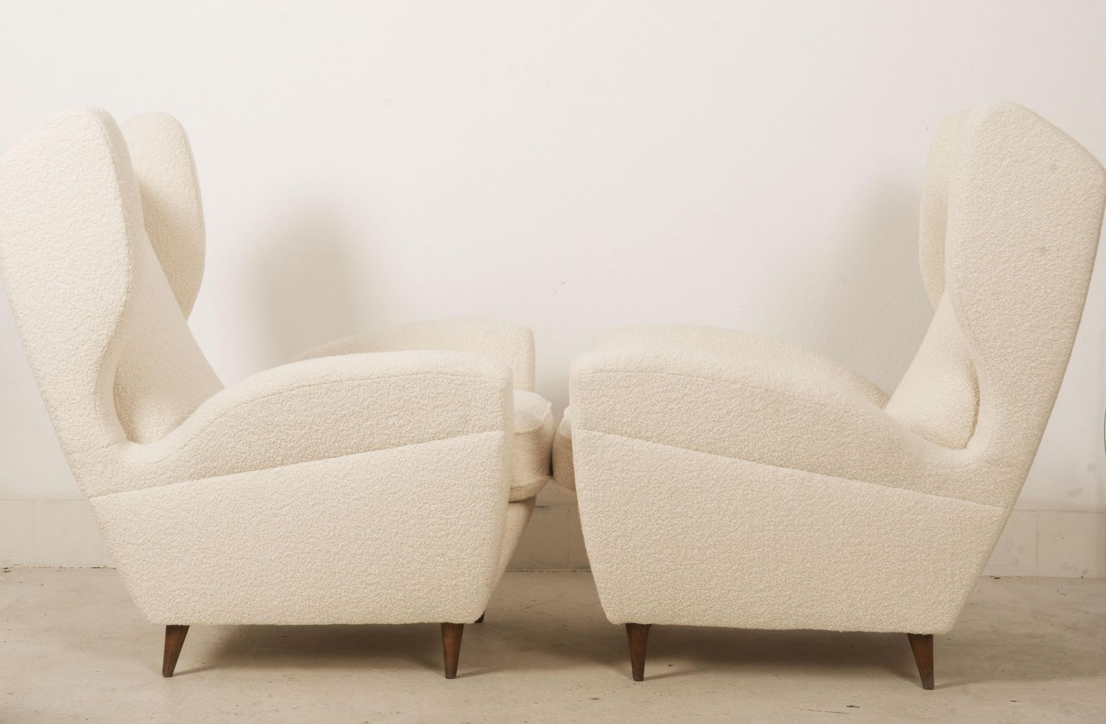 Lounge Or Wingback Chairs In Cream Bouclé By Melchiorre Bega photo for sale
