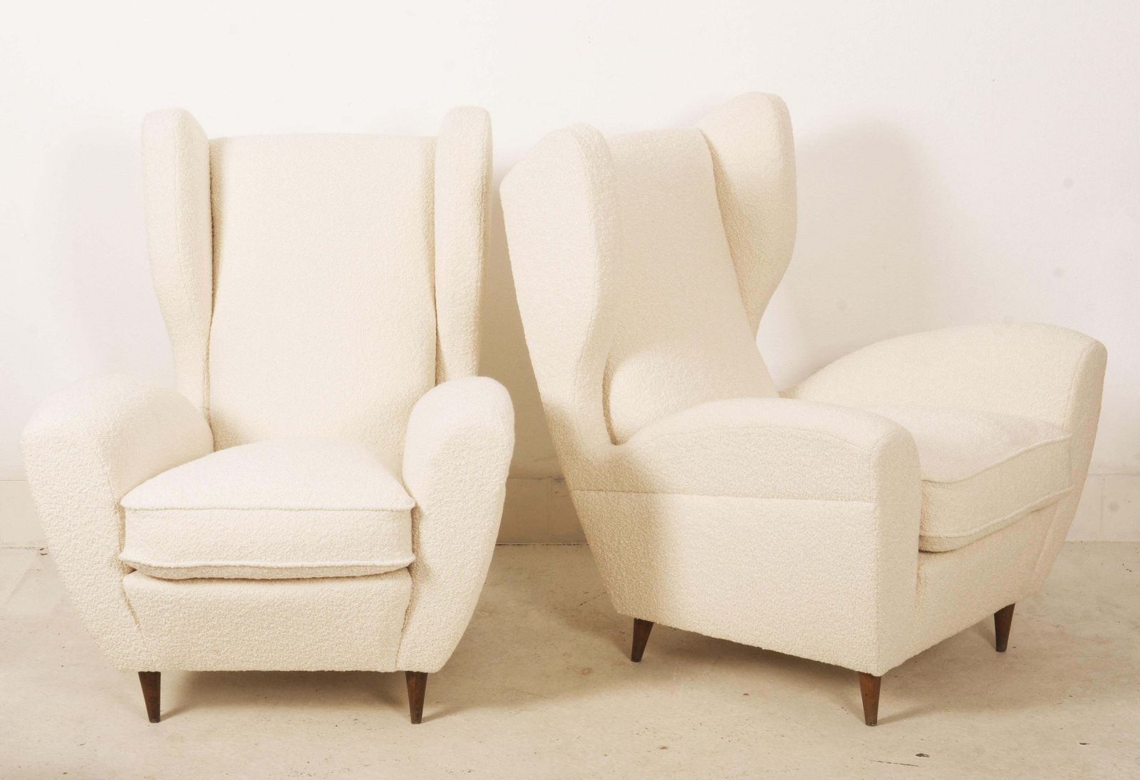 photo furniture Lounge Or Wingback Chairs In Cream Bouclé By Melchiorre Bega