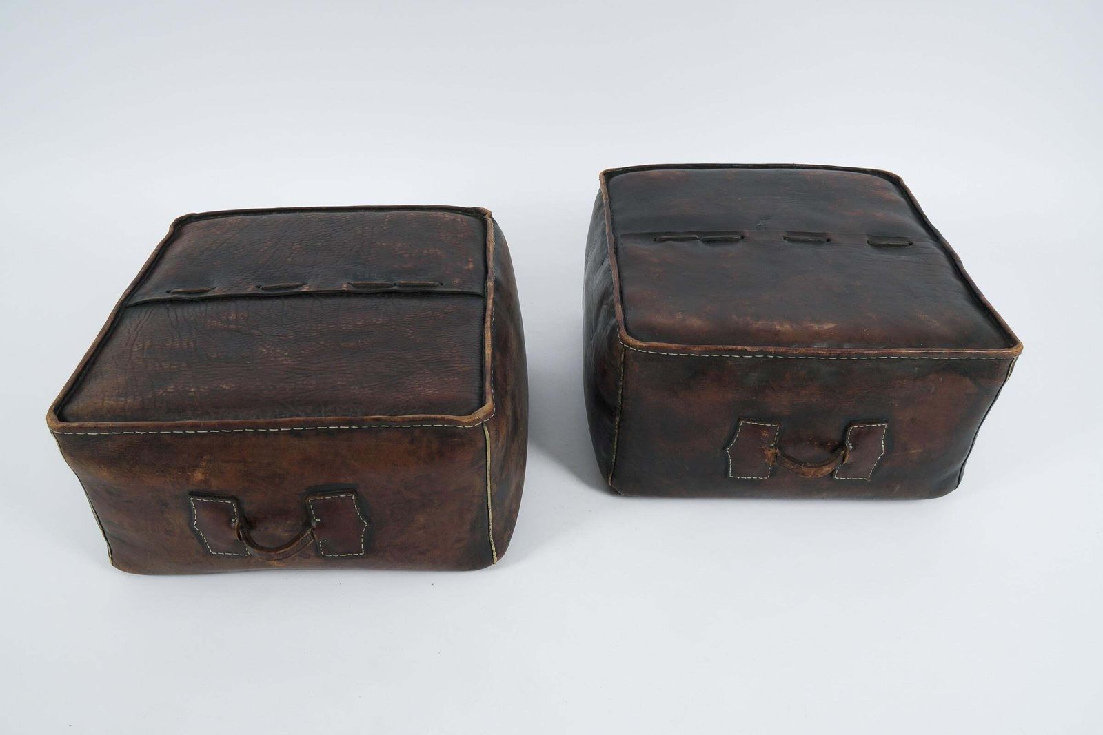 Pair Of Mid Century Modern Handmade Neck Leather Poufs photo furniture