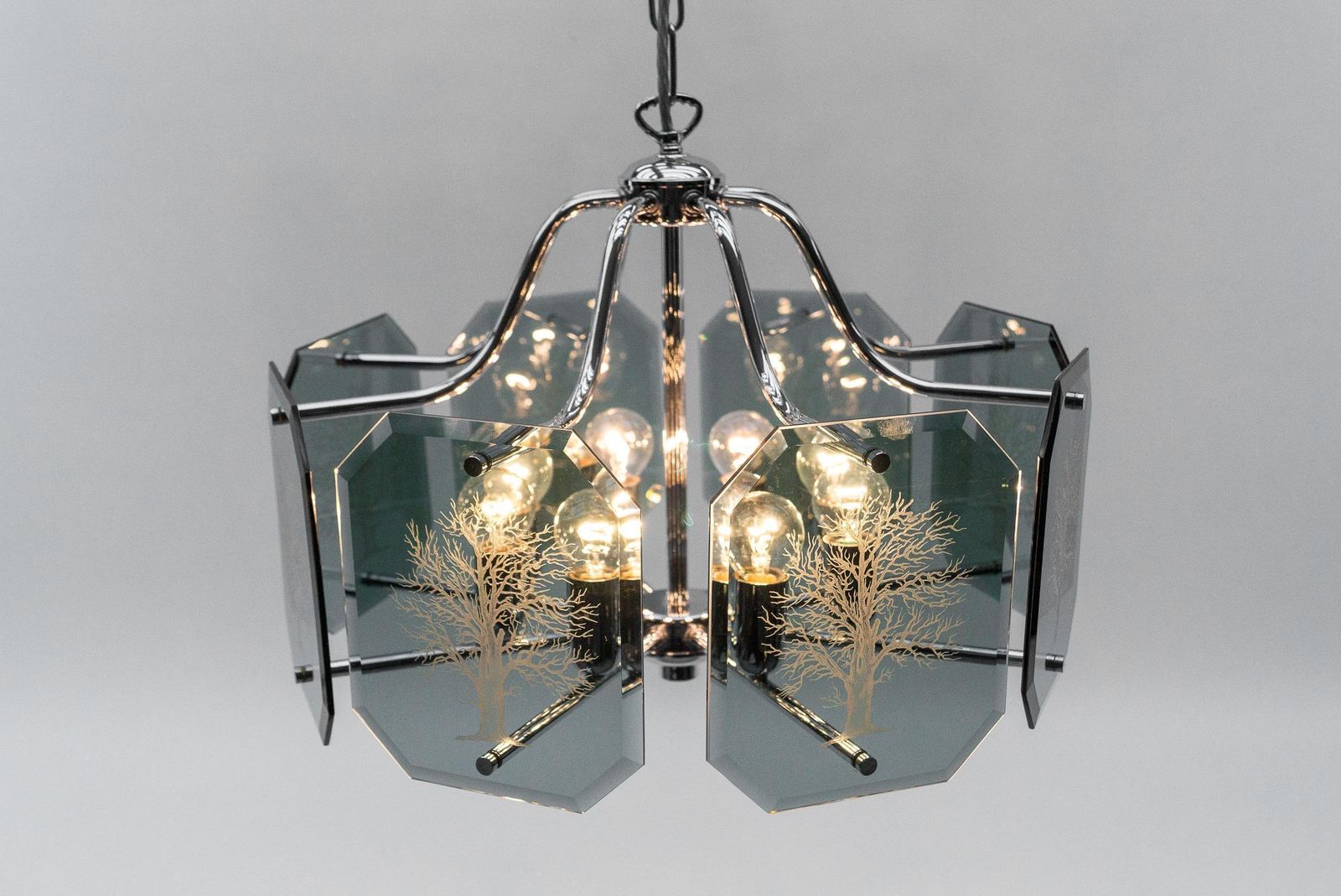 photo furniture Chandelier In Chrome With 8 Cut Glass Panes With Tree Of Life Motif, 1960s
