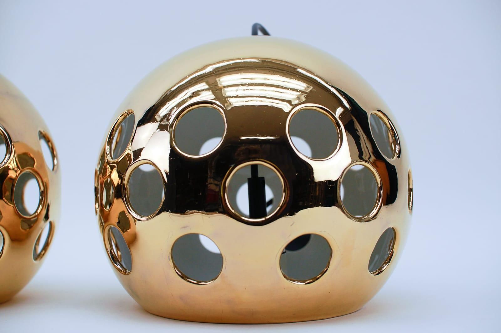 photo for sale A Pair Of Very Rare Gold Glazed Ceramic Wall Lamps, 1960s Italy