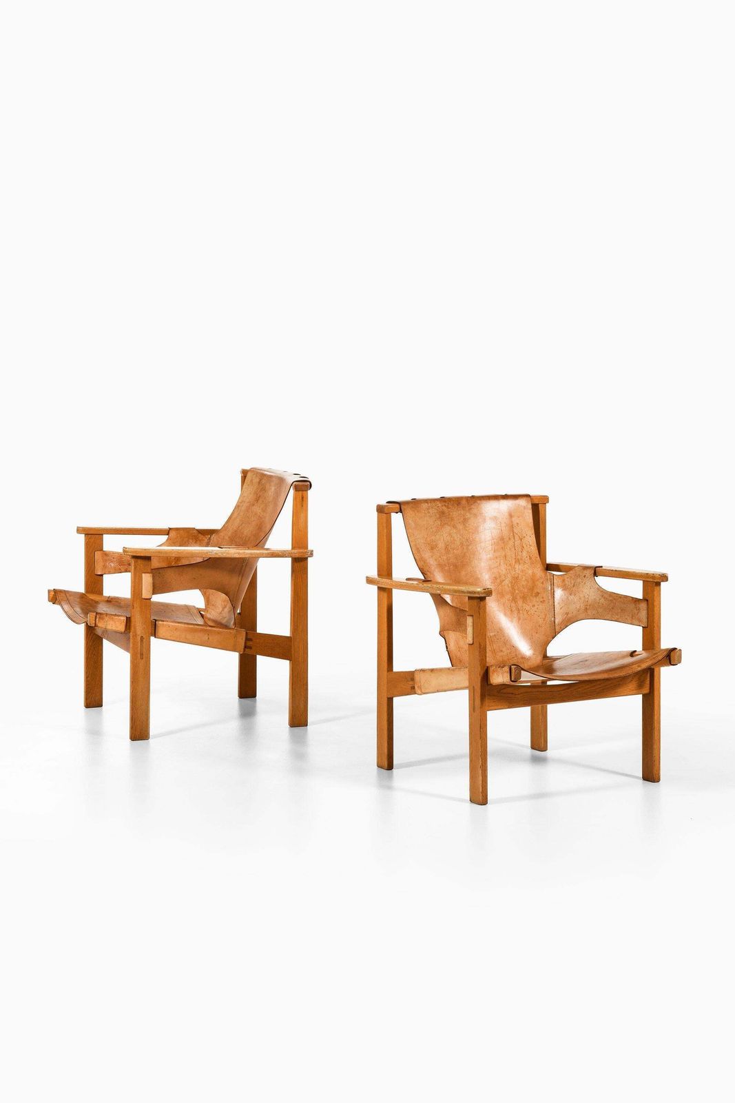 Pair Of Trienna Easy Chairs In Oak & Original Leather By Carl Axel Acking, 1957 photo for sale