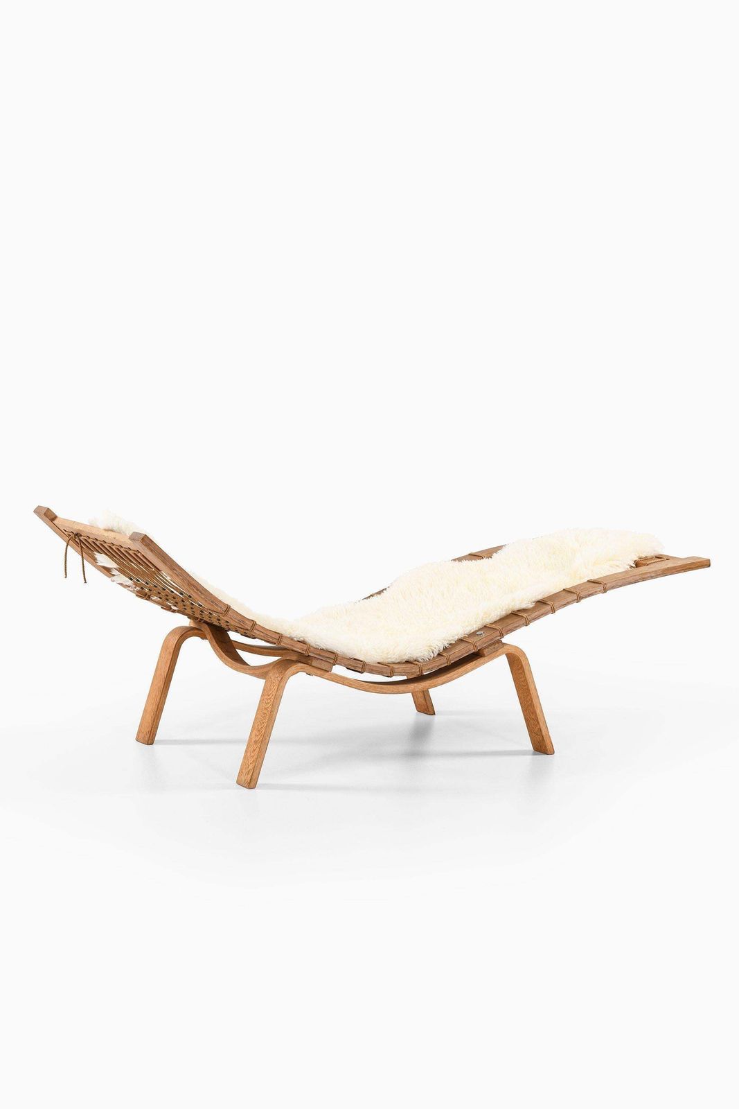 Lounge Chair In Oak And Sheepskin By Hans Wegner, Circa 1960s photo furniture