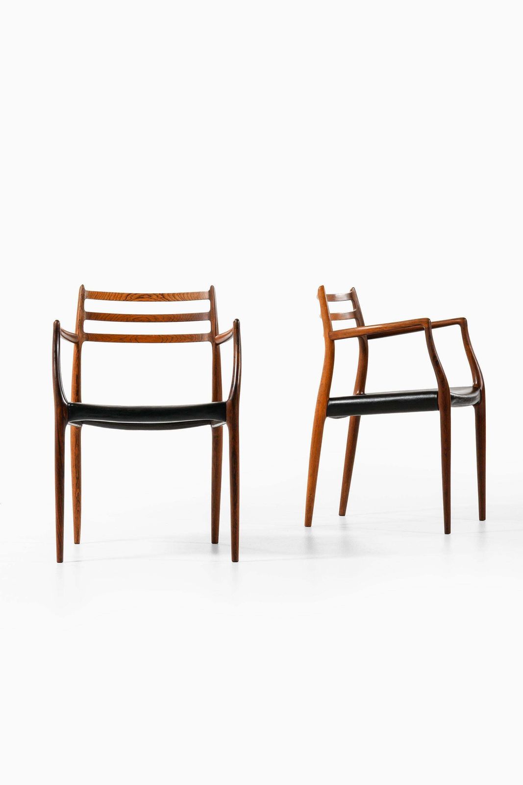 Set Of 10 Armchairs In Rosewood And Black Leather By Niels Otto Møller, 1960's photo furniture