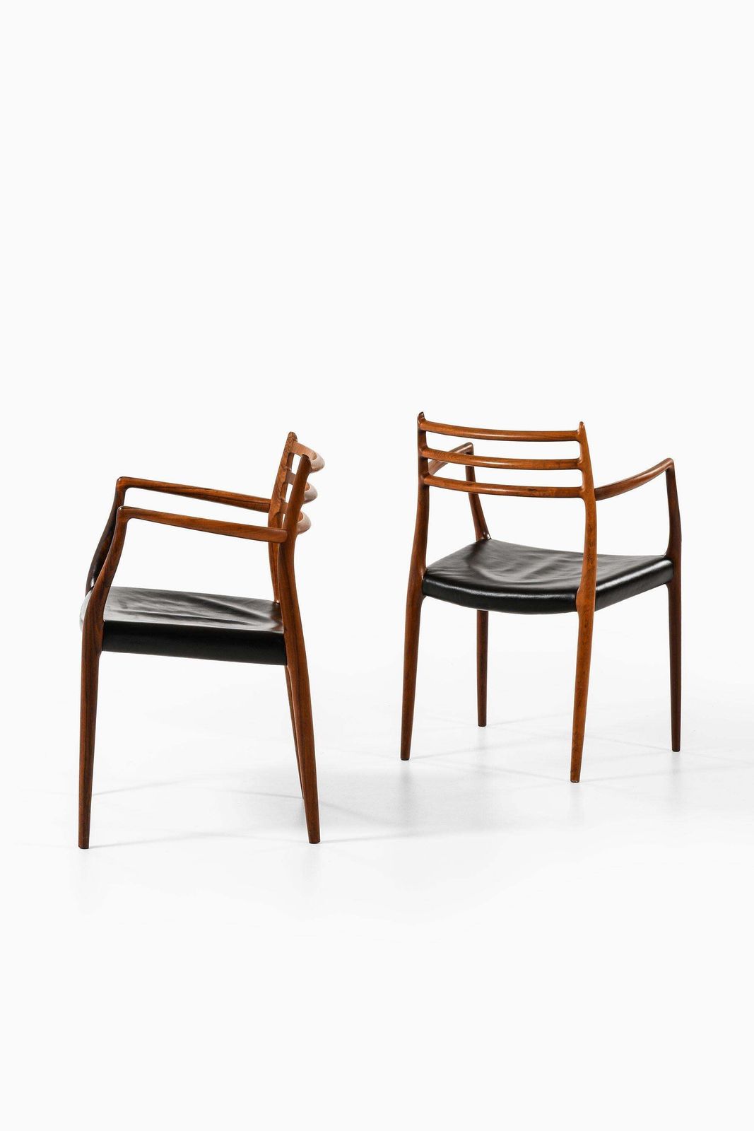 Set Of 10 Armchairs In Rosewood And Black Leather By Niels Otto Møller, 1960's photo buy