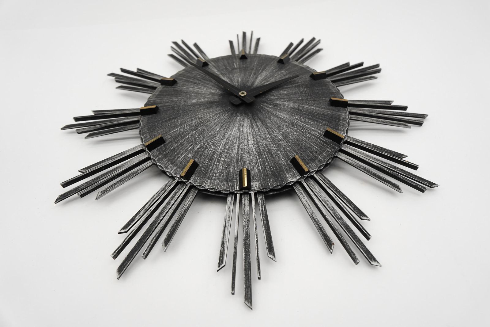 Mid Century Modern Iron And Brass Sunburst Wall Clock By Atlanta Electric photo for sale
