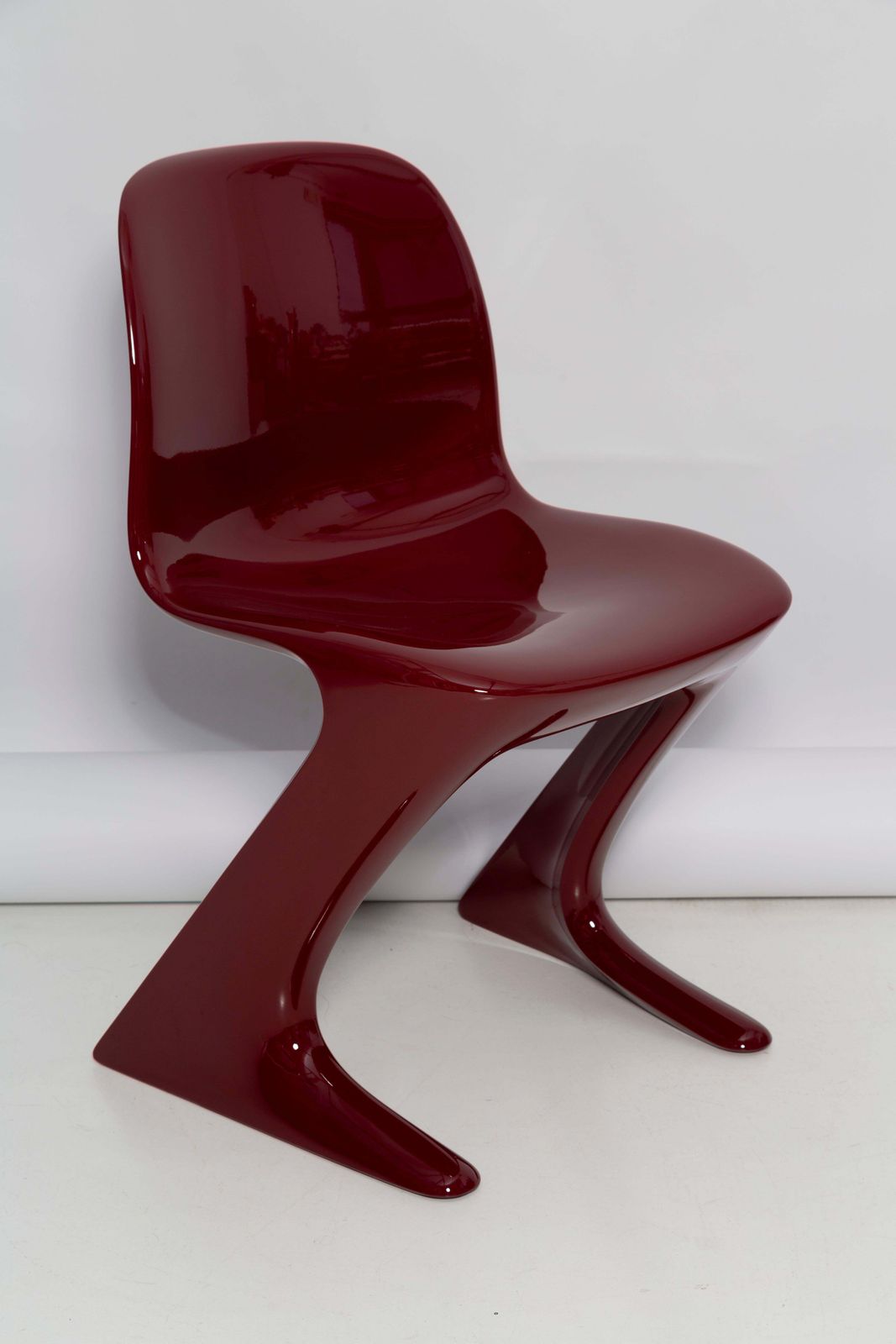 photo furniture Set Of Three Red Wine Kangaroo Chairs Designed By Ernst Moeckl, Germany, 1968