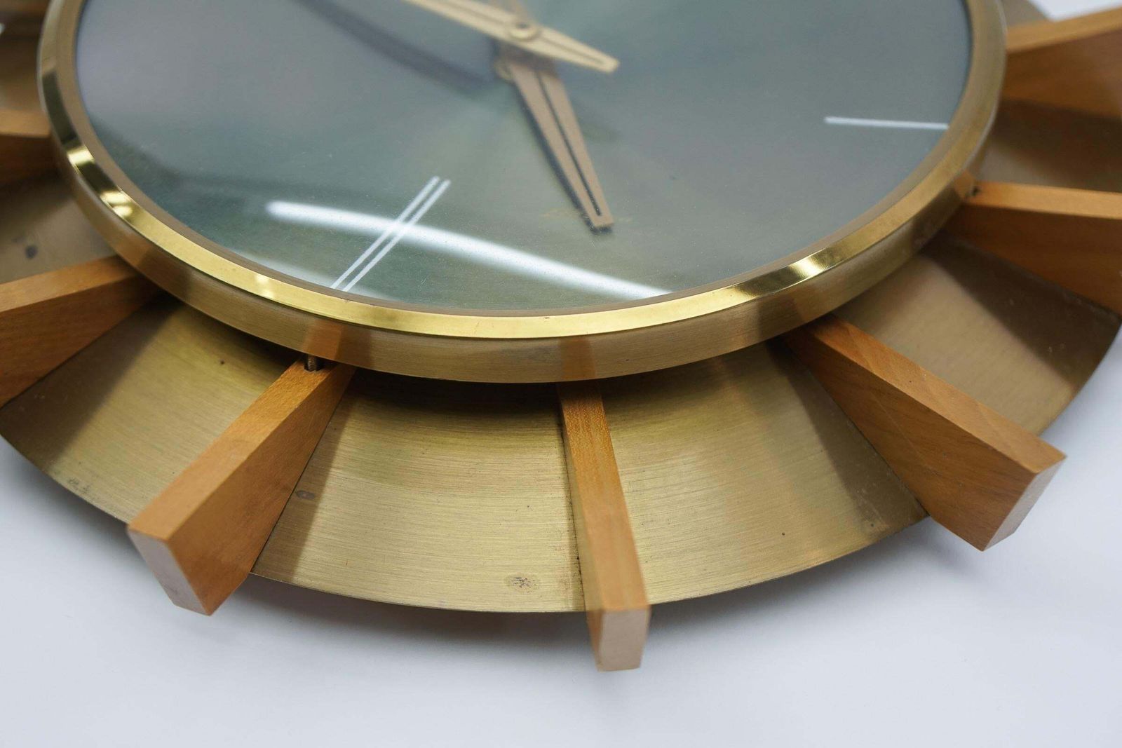 Mid Century Modern Brass And Wood Sunburst Wall Clock By Atlanta Electric photo 1064.0
