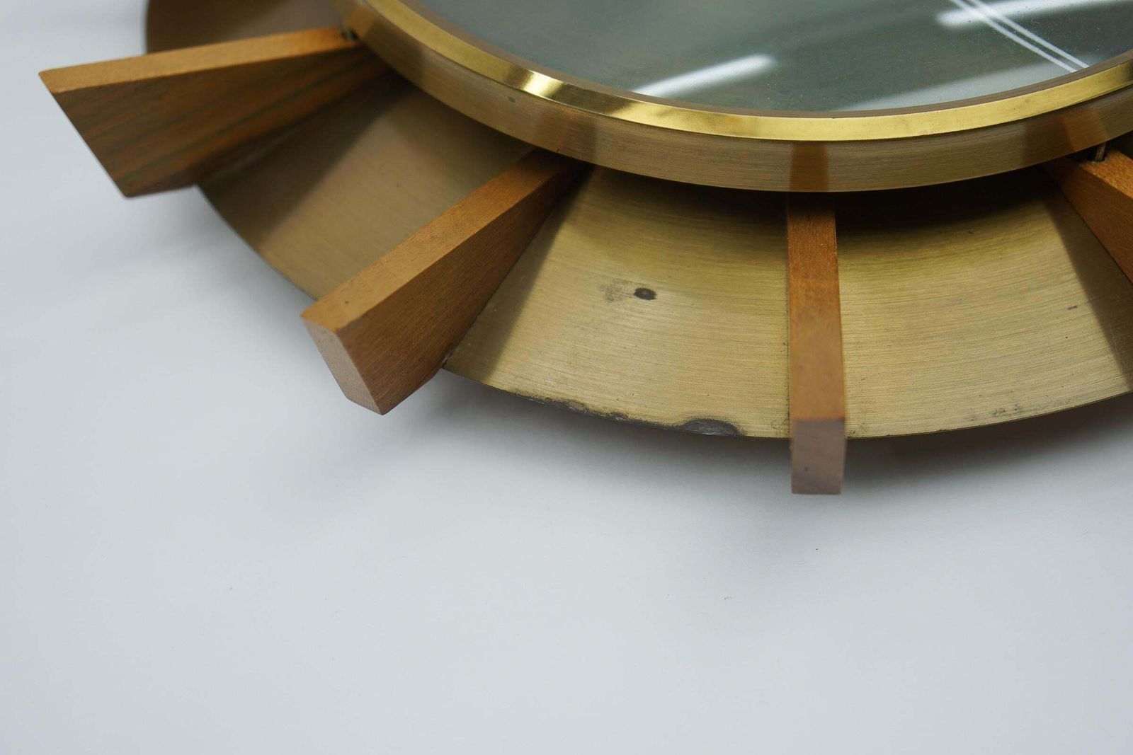 Mid Century Modern Brass And Wood Sunburst Wall Clock By Atlanta Electric photo vinterior