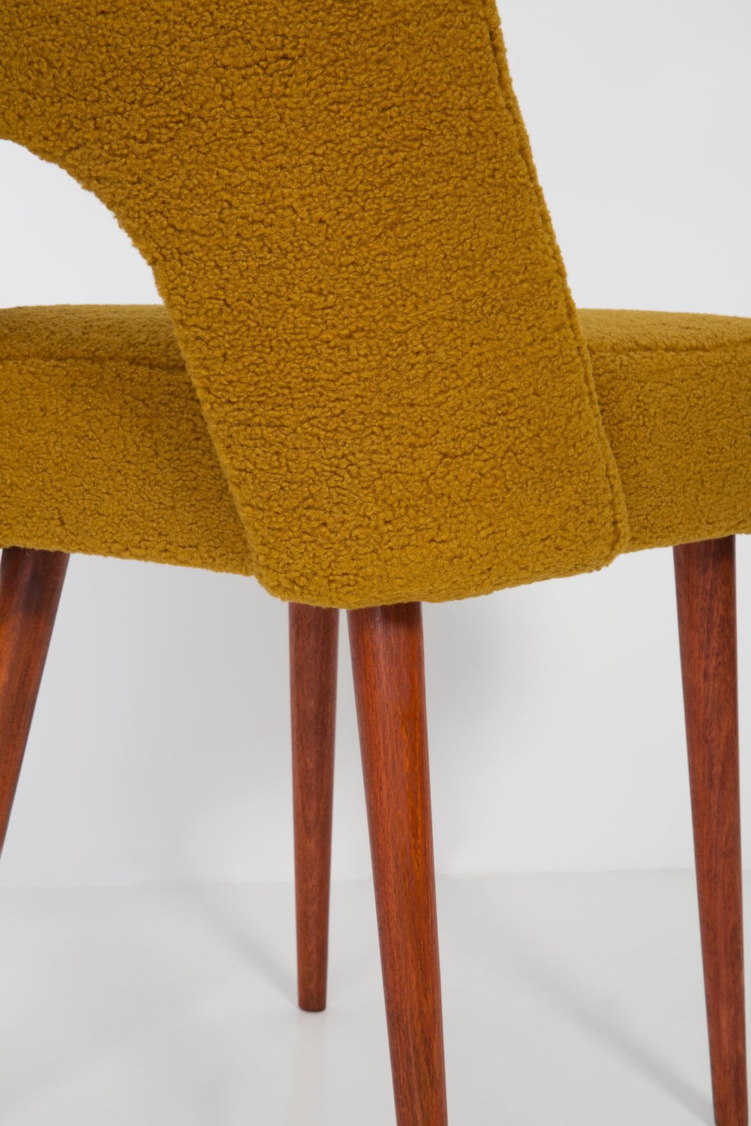 photo buy Set Of Twelve Yellow Ochre Boucle 'Shell' Chairs, 1960s