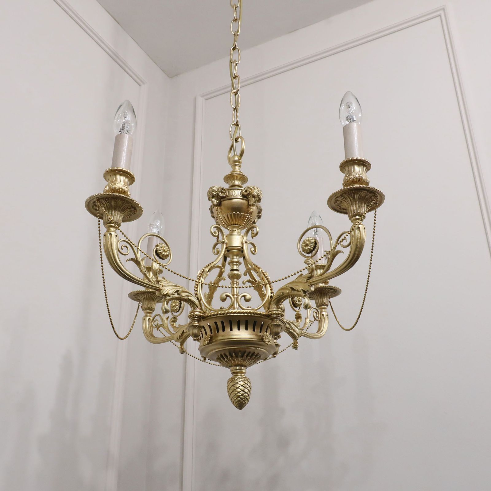 French Early 20th Century Four Arm Brass Chandelier photo for sale