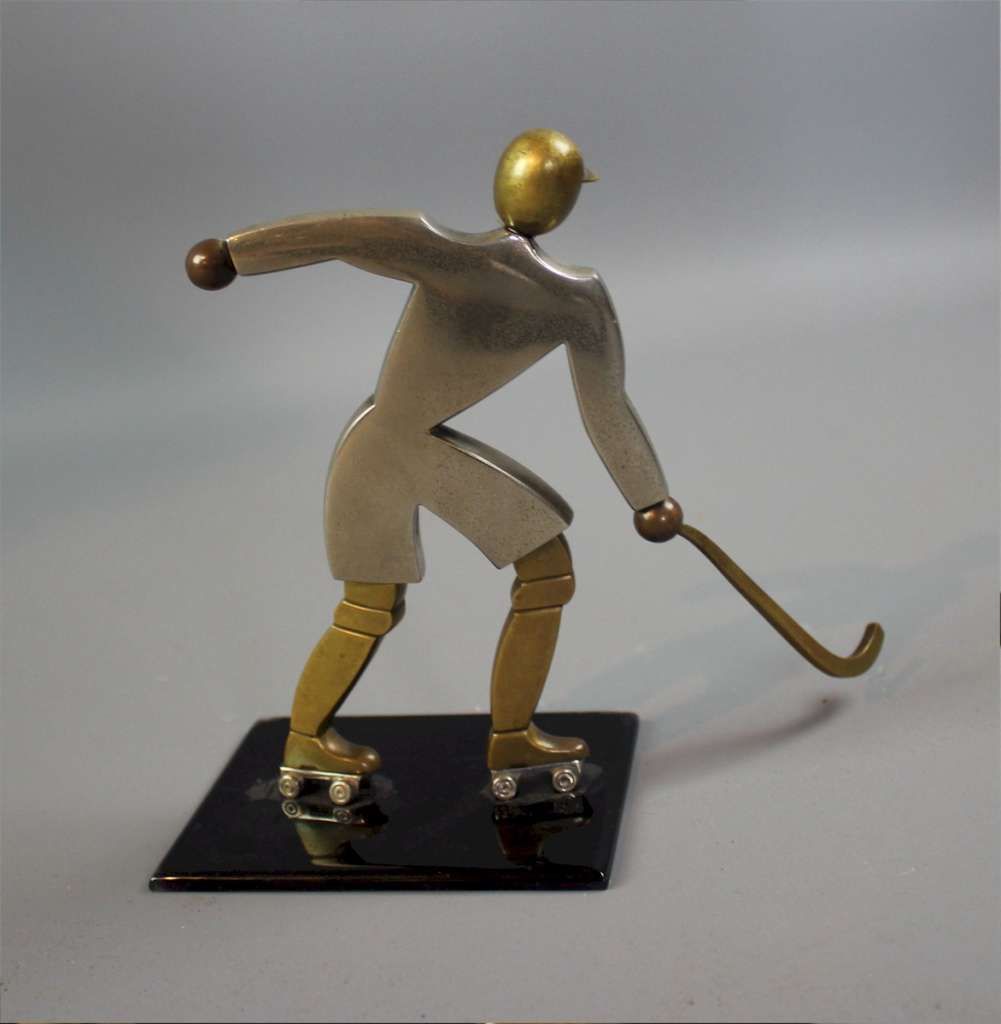 Art Deco Brass Figure Of An Ice Hockey Player photo furniture
