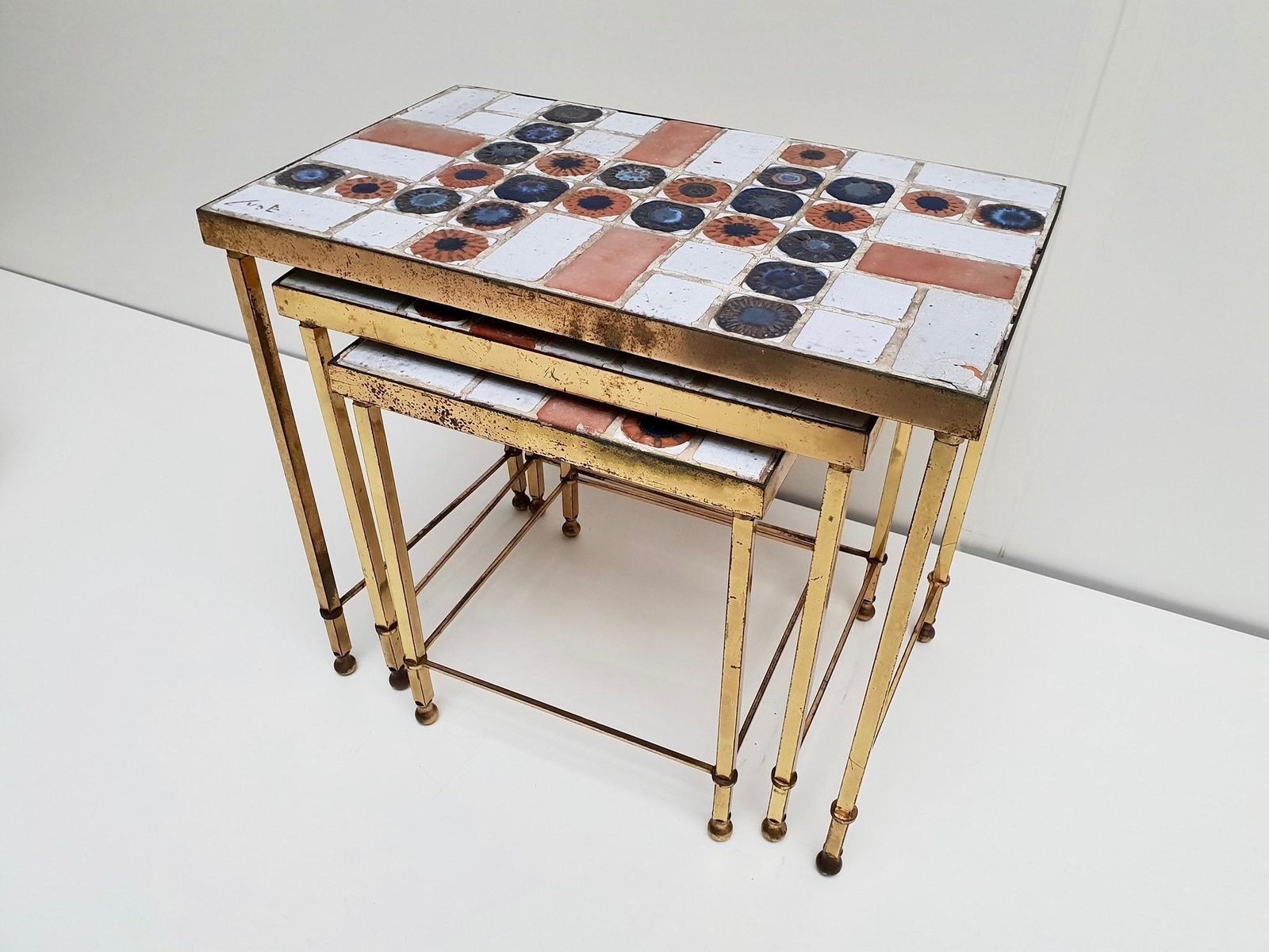 photo for sale Set Of 3 Belgian Vintage Polished Brass And Ceramic Nesting Tables