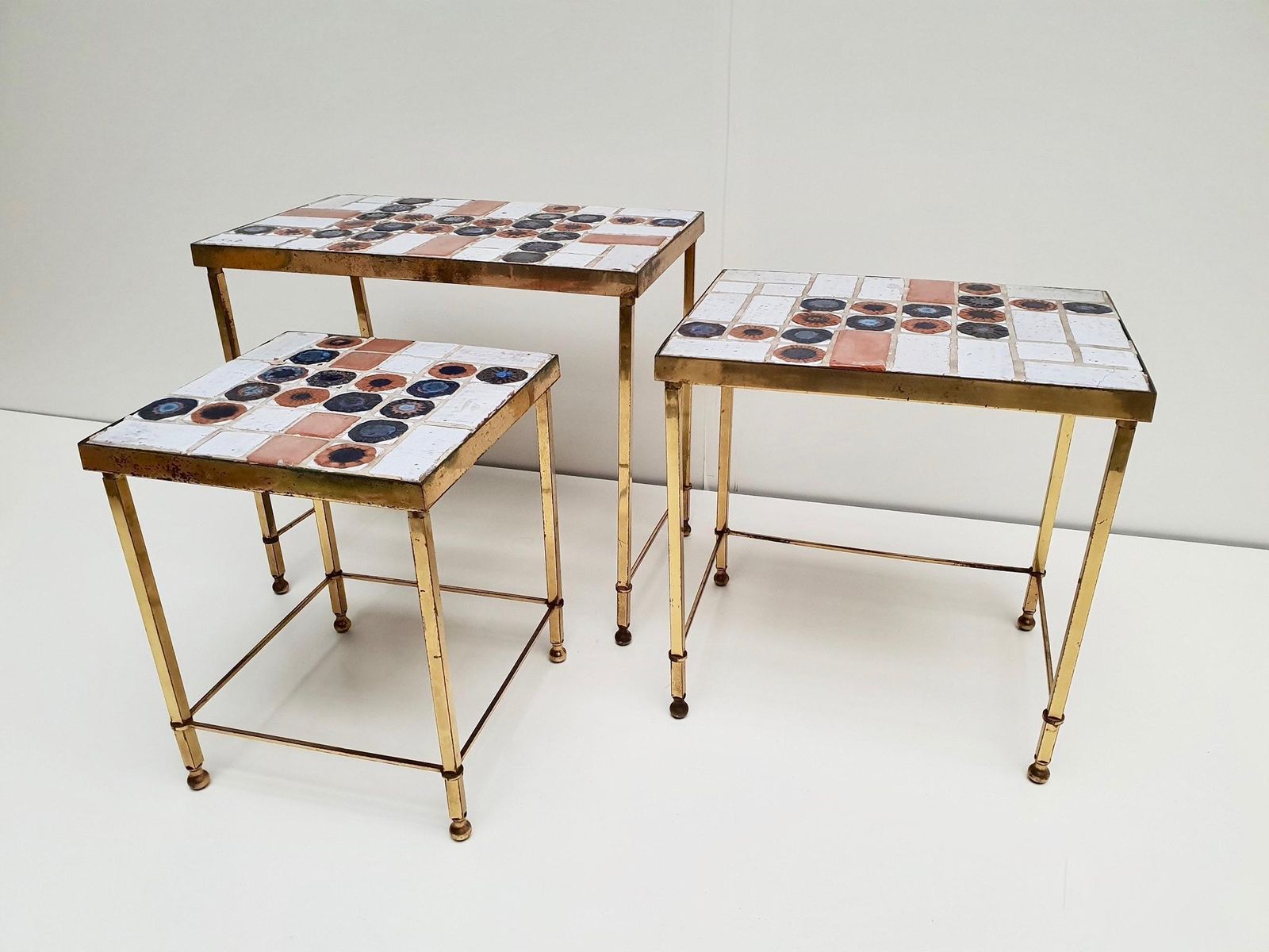 1445.0 Set Of 3 Belgian Vintage Polished Brass And Ceramic Nesting Tables photo