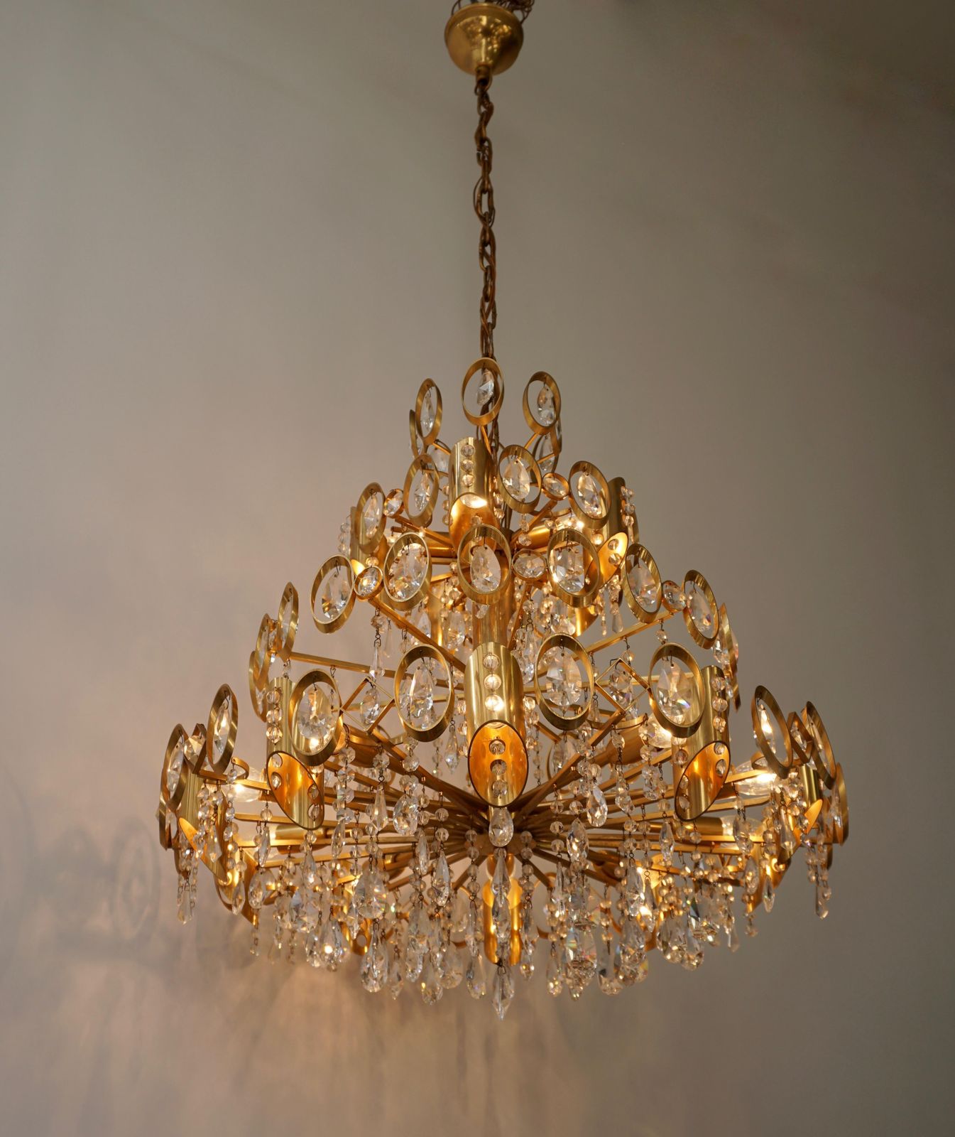 Glamorous Hollywood Regency Gilt Brass And Crystal Palwa Chandelier photo for sale
