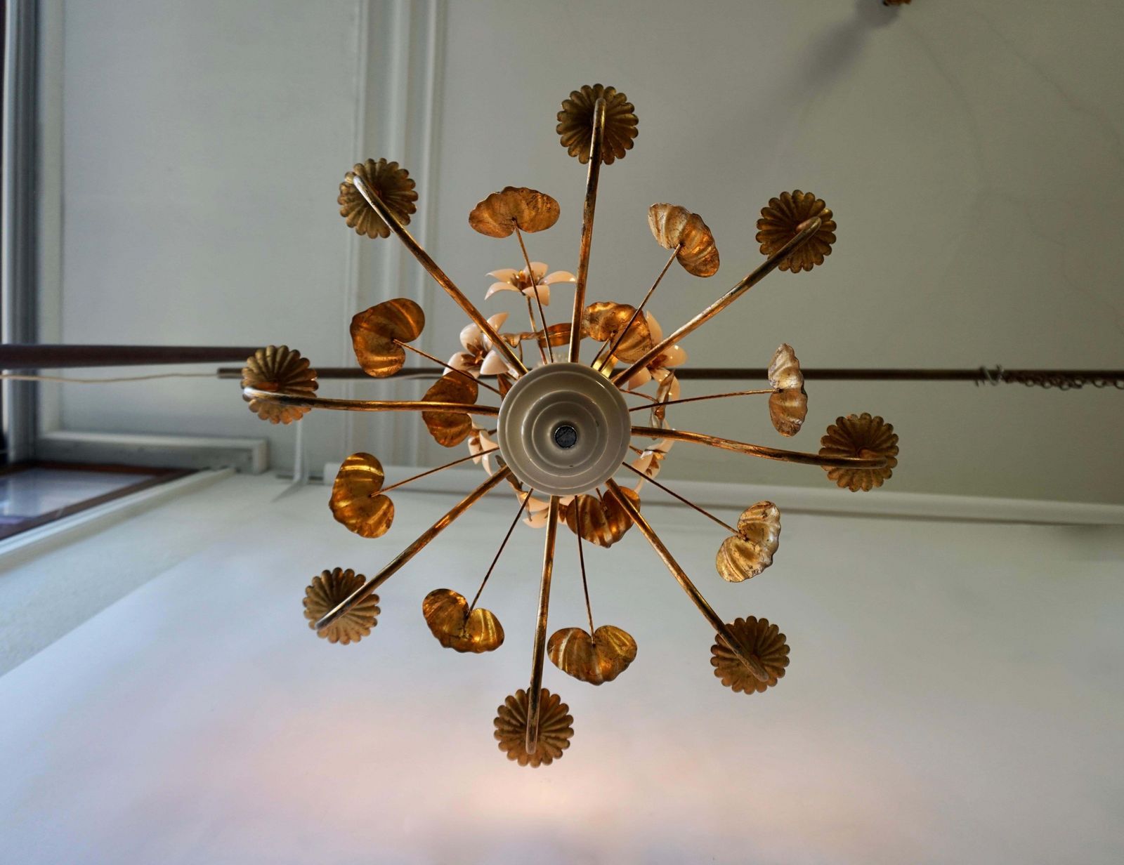 Chandelier With Golden Leaves And White Flowers photo buy