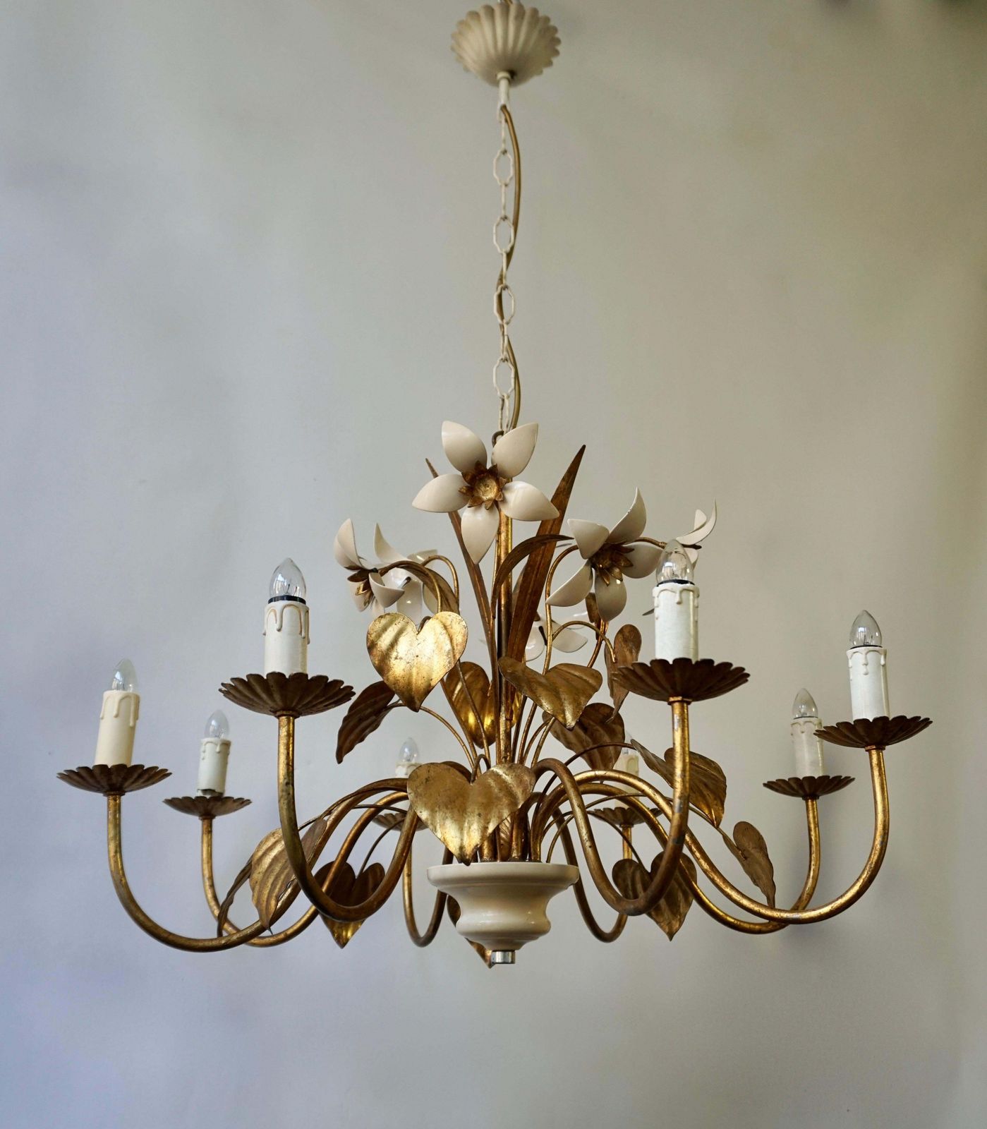 Chandelier With Golden Leaves And White Flowers photo vintage