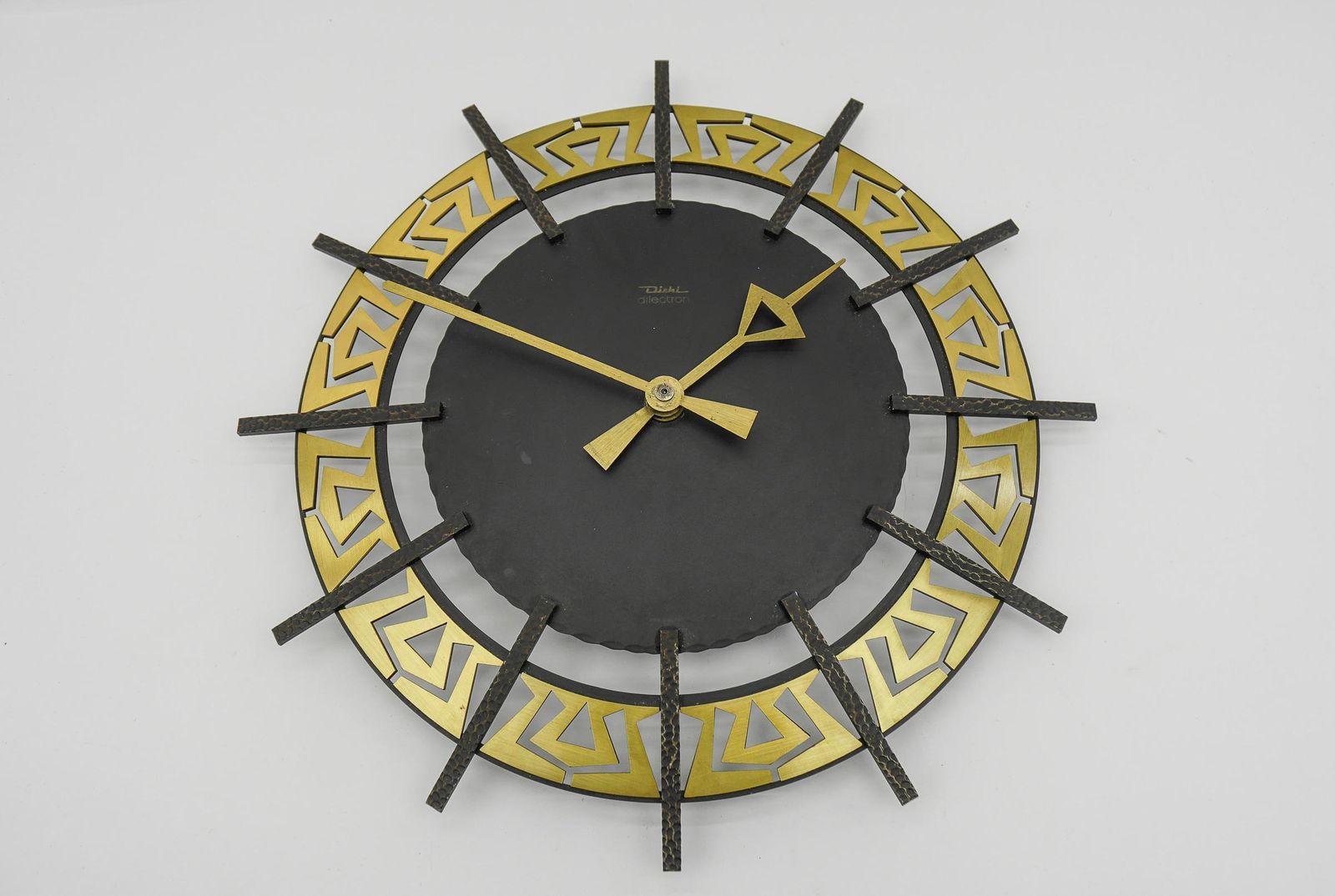 Mid Century Modern Iron And Brass Wall Clock By Diehl Dilectron, 1960s photo for sale