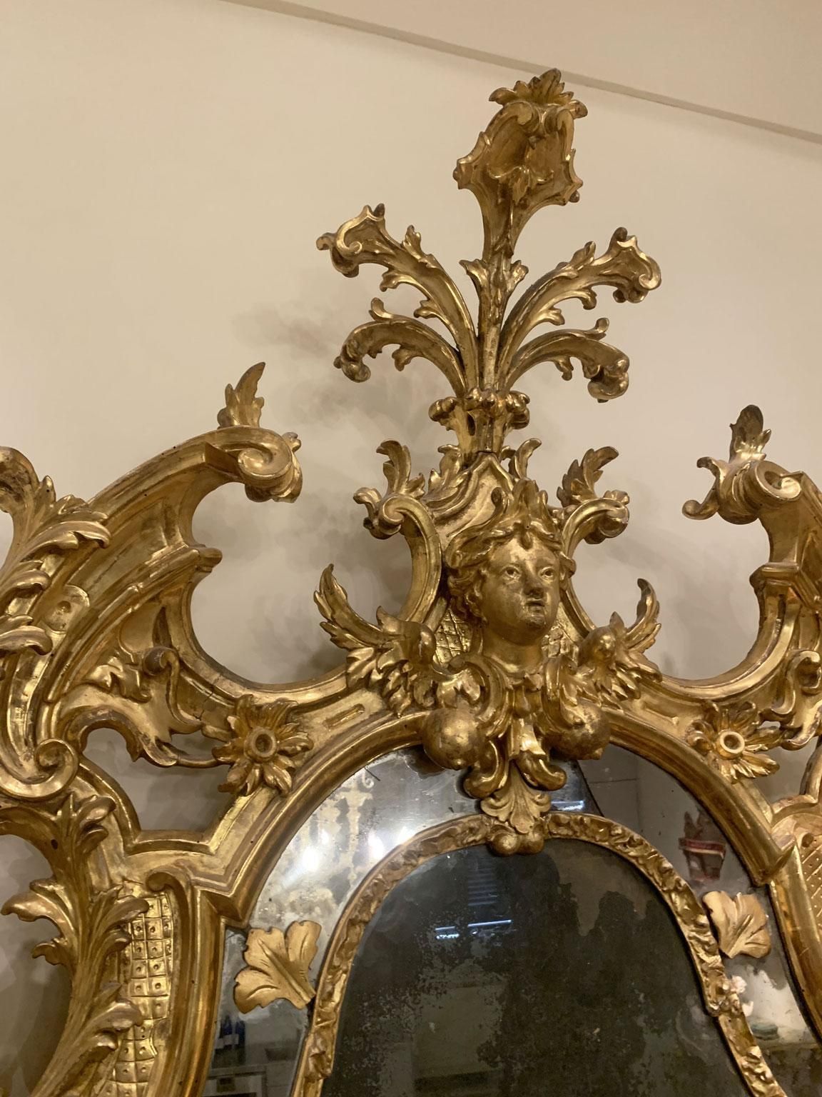 photo furniture Italy Early 18th Century Barocco Giltwood And Carved Fireplace Mirror
