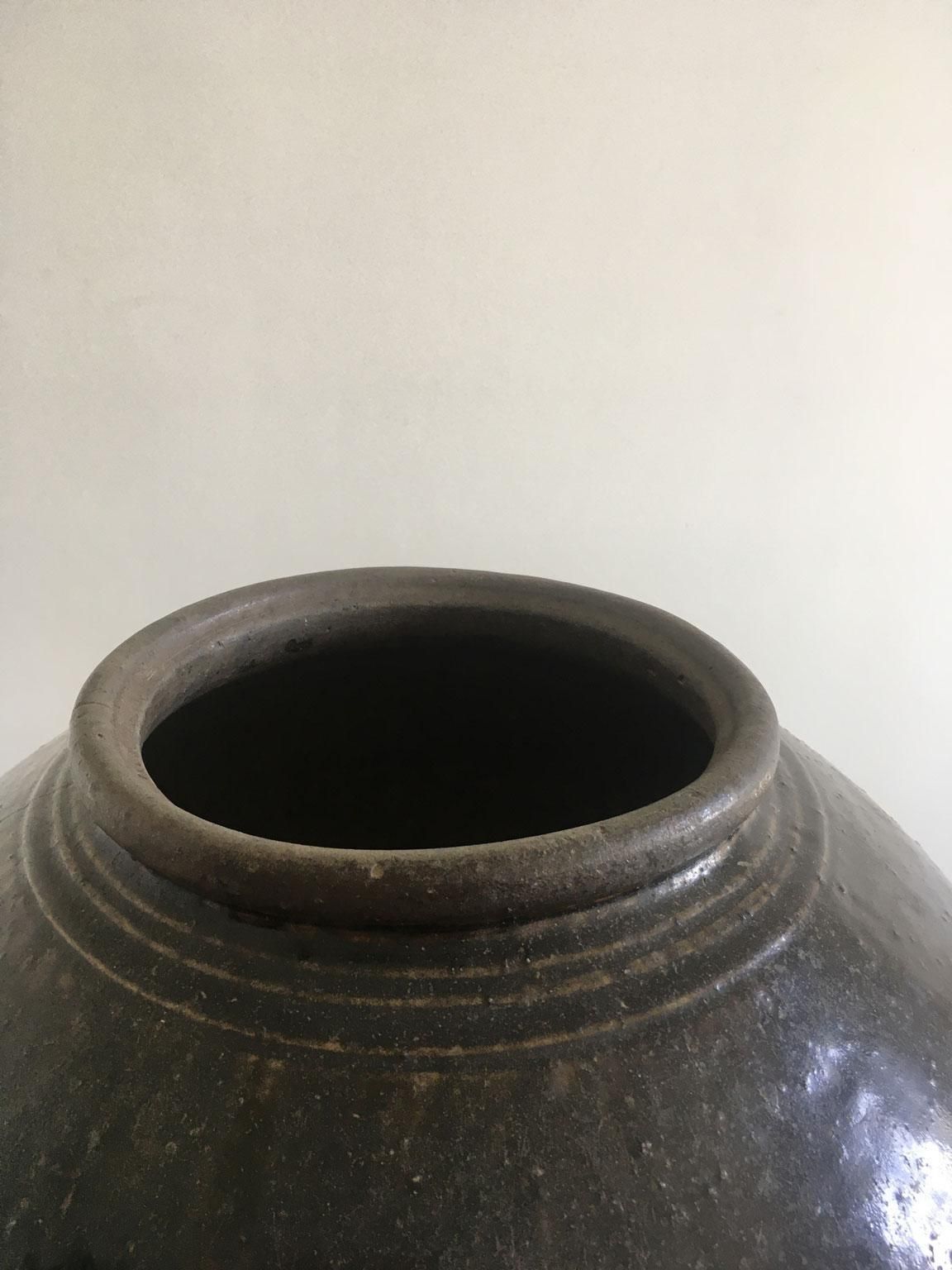 photo furniture Late 18th Century Khmer Brown Glazed Terracotta Vase