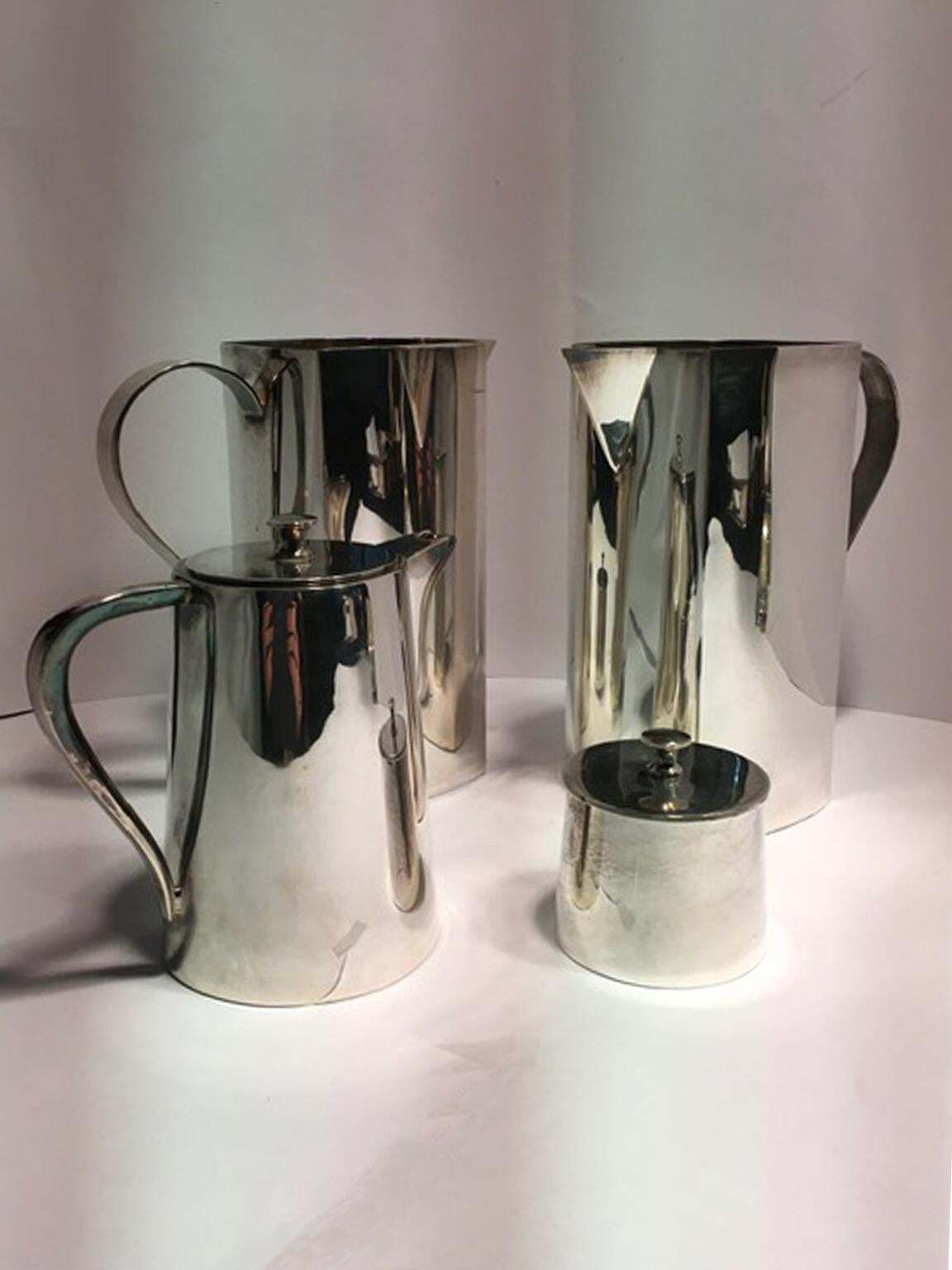 Set Of Four Pieces Pair Silver Plate Water Carafes Coffee Pot And Sugar Bowl photo for sale