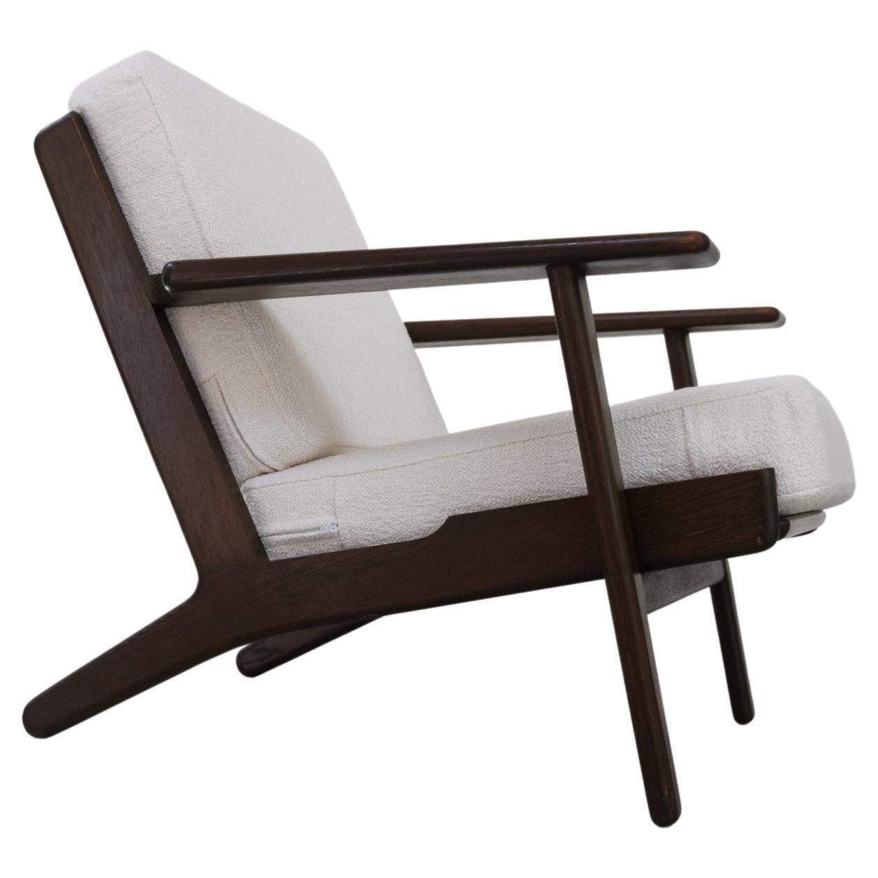 Vintage Danish Oak And Bouclé Lounge Chair Ge290 By Hans J. Wegner, 1960s