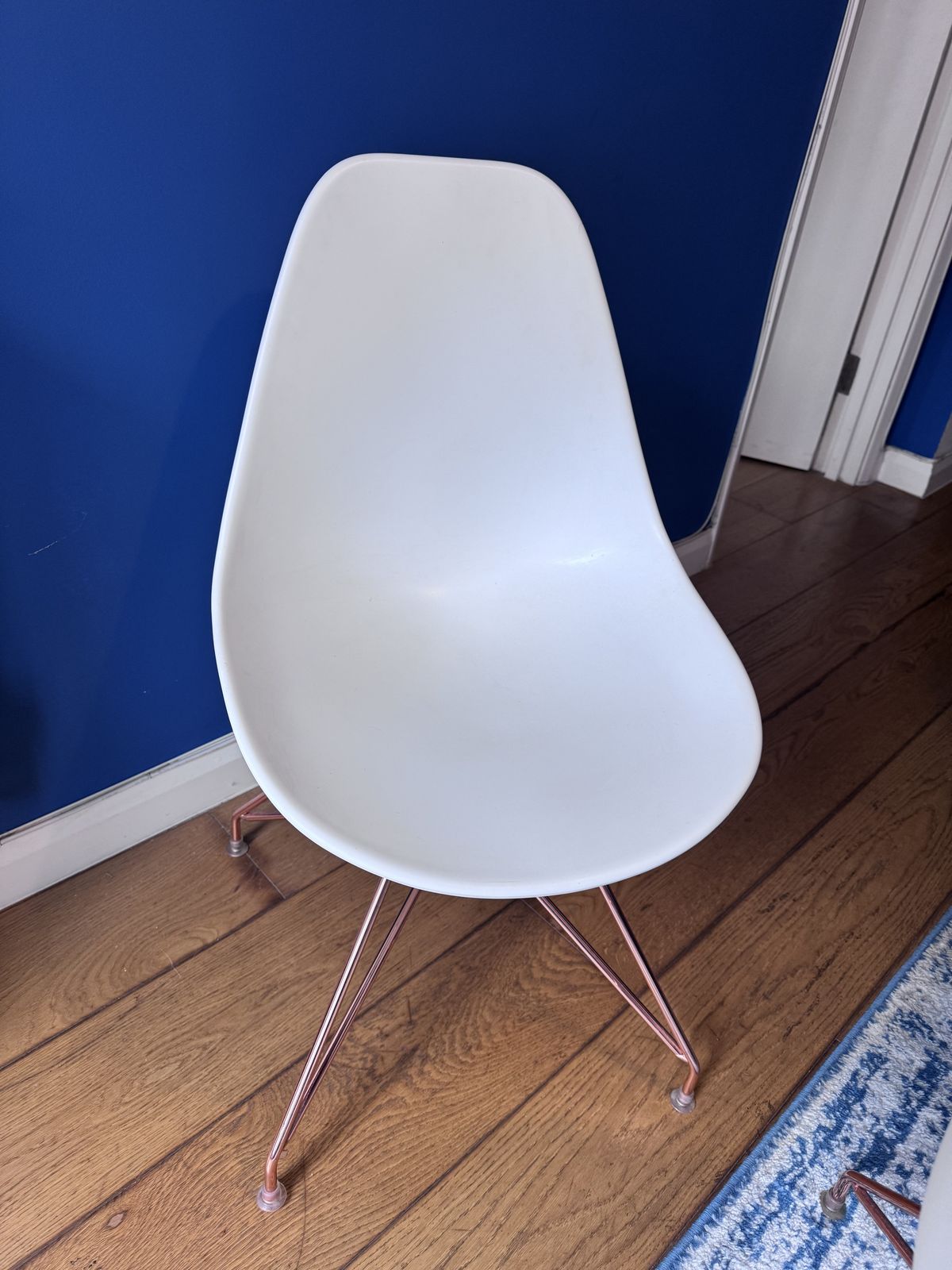 Modern White Molded Plastic Chair With Stylish Rose Gold Metal Legs photo 300.0