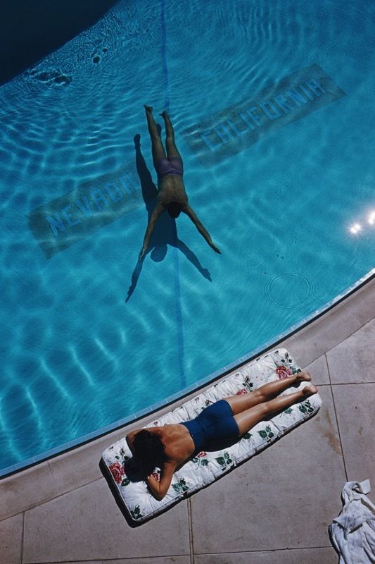 Slim Aarons 'Swimmer And Sunbather' Framed White