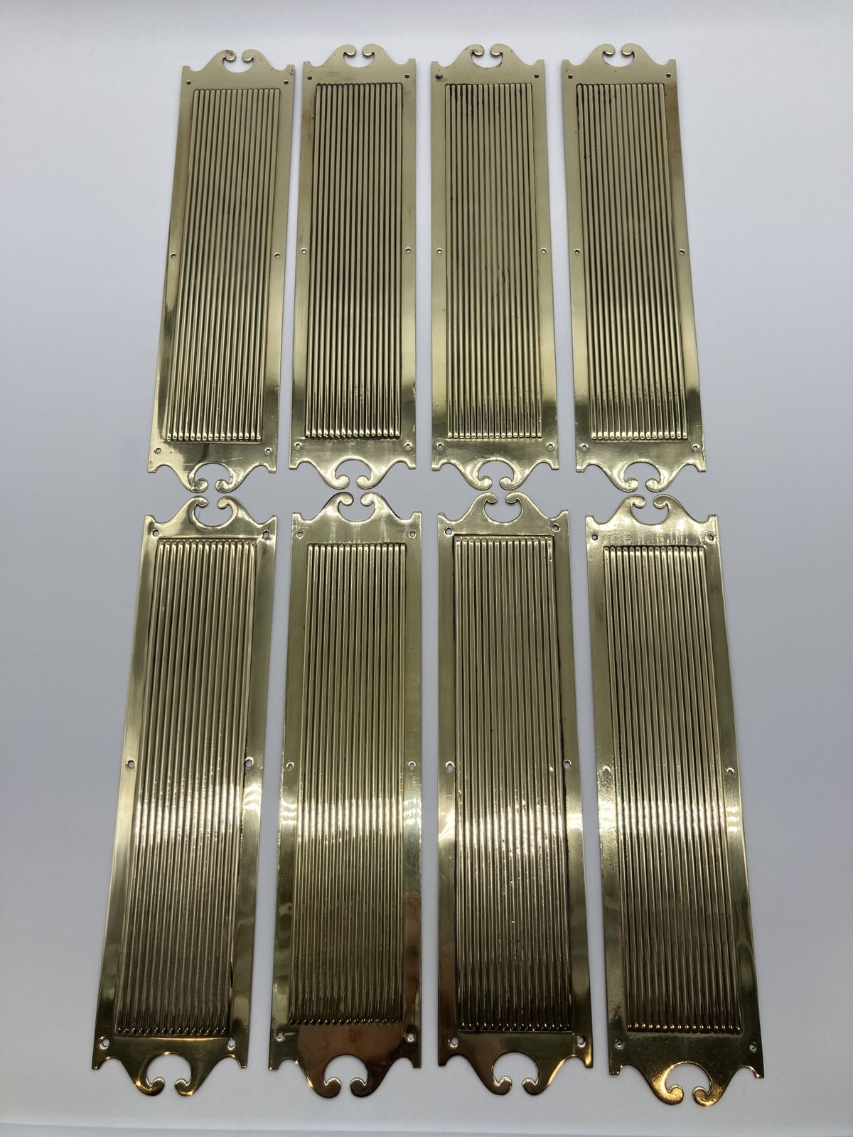 Set Of Eight Queen Anne Style Brass Finger Plates