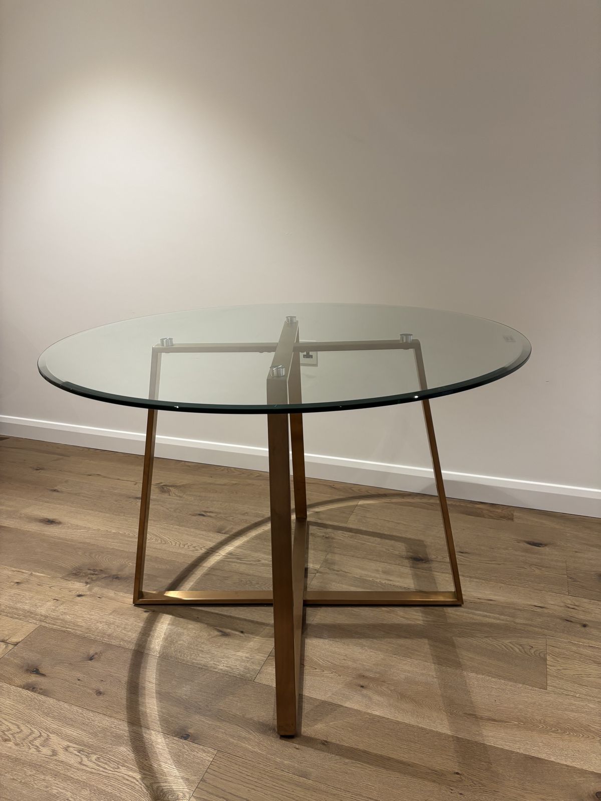 Made   Haku 4 Seater Round Dinning Table In Brass And Smoked Glass