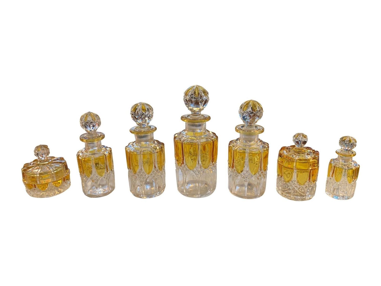 A. Collection Of Seven Val Sat Lambert 1920s Perfume Bottles. photo furniture