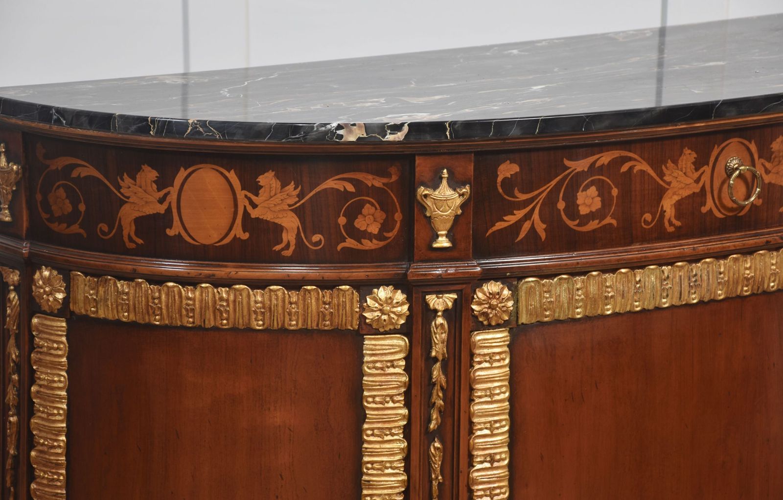 photo furniture Italian Marquetry And Mahogany Parcel Gilt Bow Front Cabinet