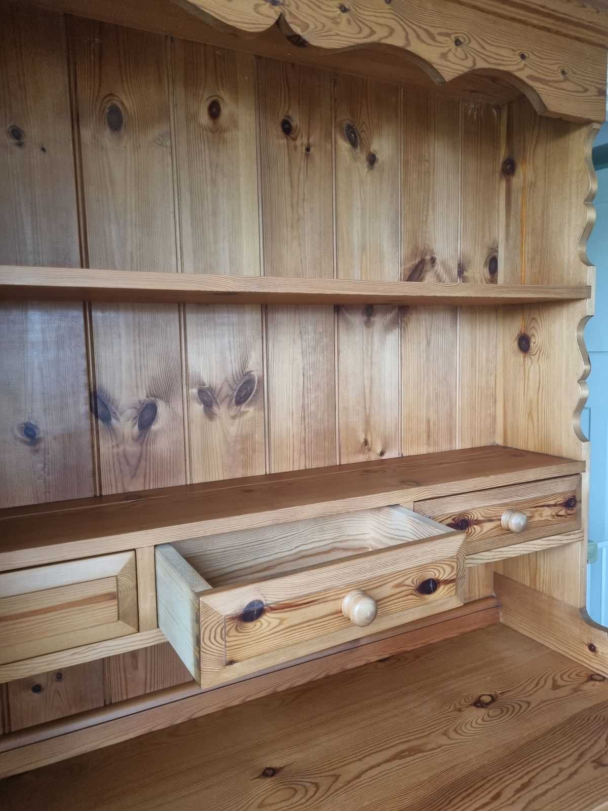 Traditional Pine Dresser, Very Well Made, Solid And In Good Condition. Comprises Of 2 Upper Shelves, 6 Draws And Large Base Cupboad For Storage. The Top Comes Off The Base For Easier Transportation. photo Furniture