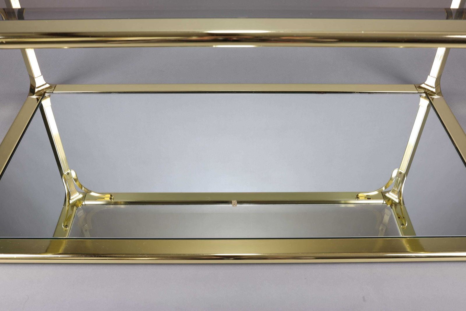 1970s Hollywood Regency Smoked Glass Coffee Table | Gold Accents Table | Glam Mid Century Modern Furniture photo vintage