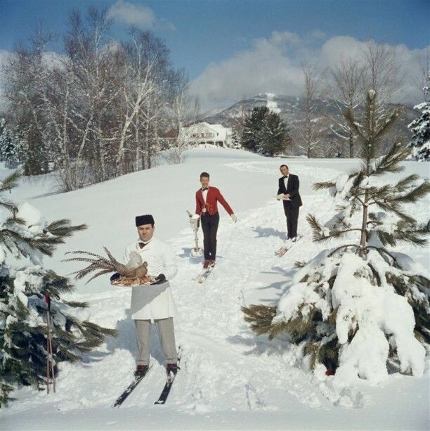 Slim Aarons 'Skiing Waiters' Framed White