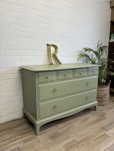 photo furniture Stag Minstrel Chest Of 4 Over 2 Drawers Painted Green