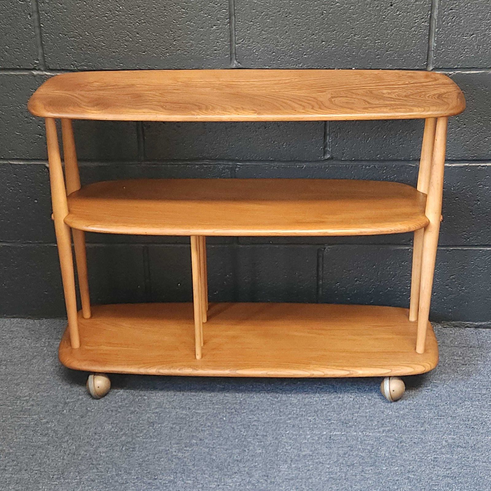 Ercol, Lucian Ercolani, Baby Giraffe Trolley Bookcase Circa 1960's, Model 361 photo furniture