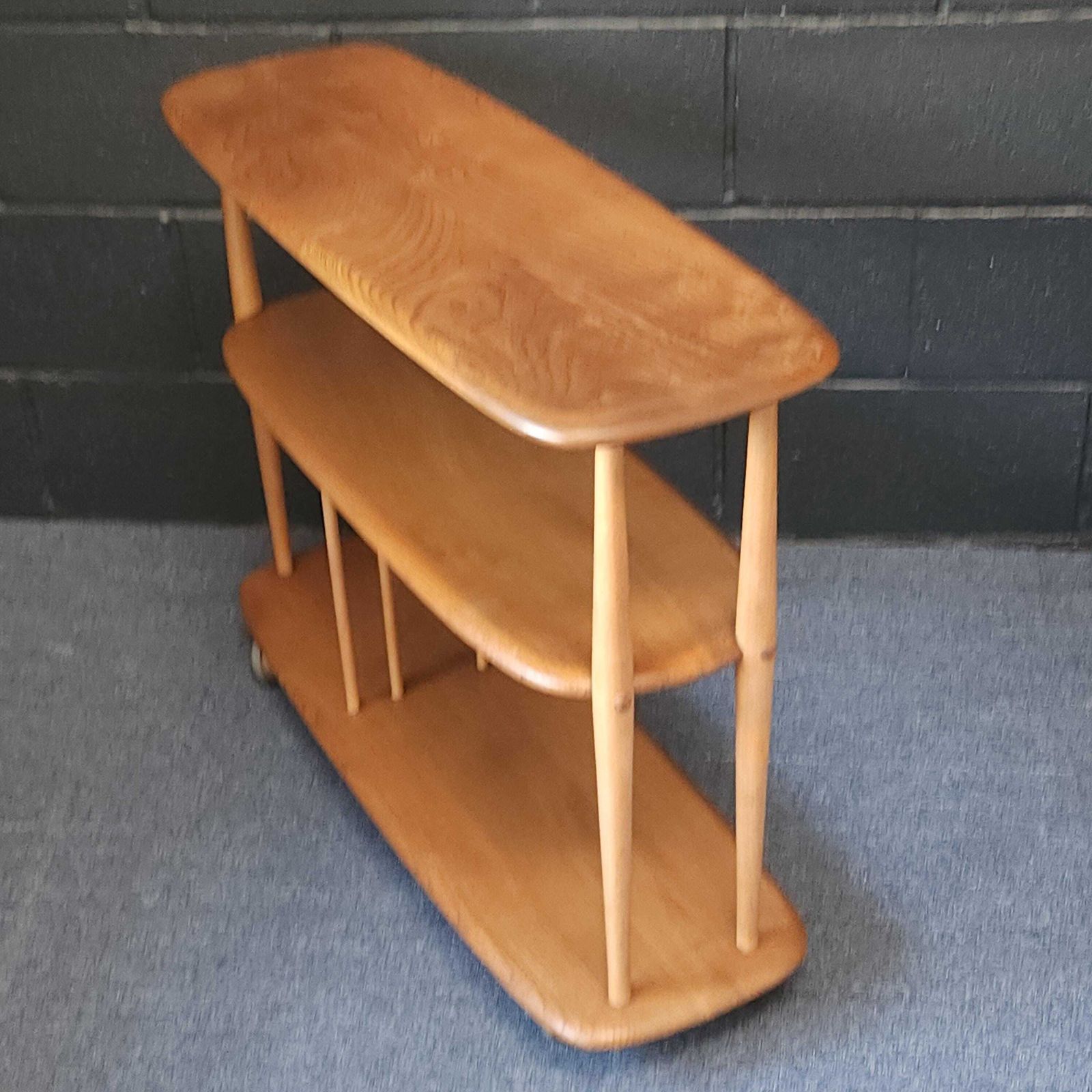 Ercol, Lucian Ercolani, Baby Giraffe Trolley Bookcase Circa 1960's, Model 361 photo for sale