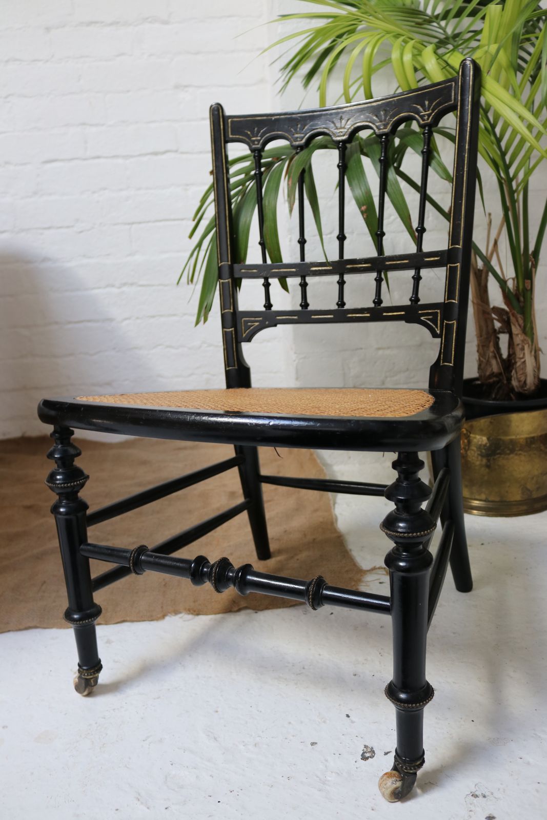 Antique Black Rattan Nursing Chair photo buy