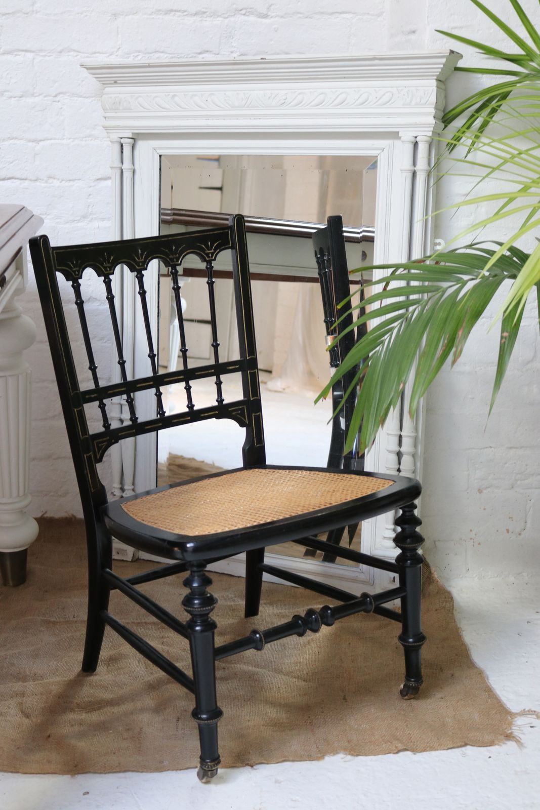 photo furniture Antique Black Rattan Nursing Chair
