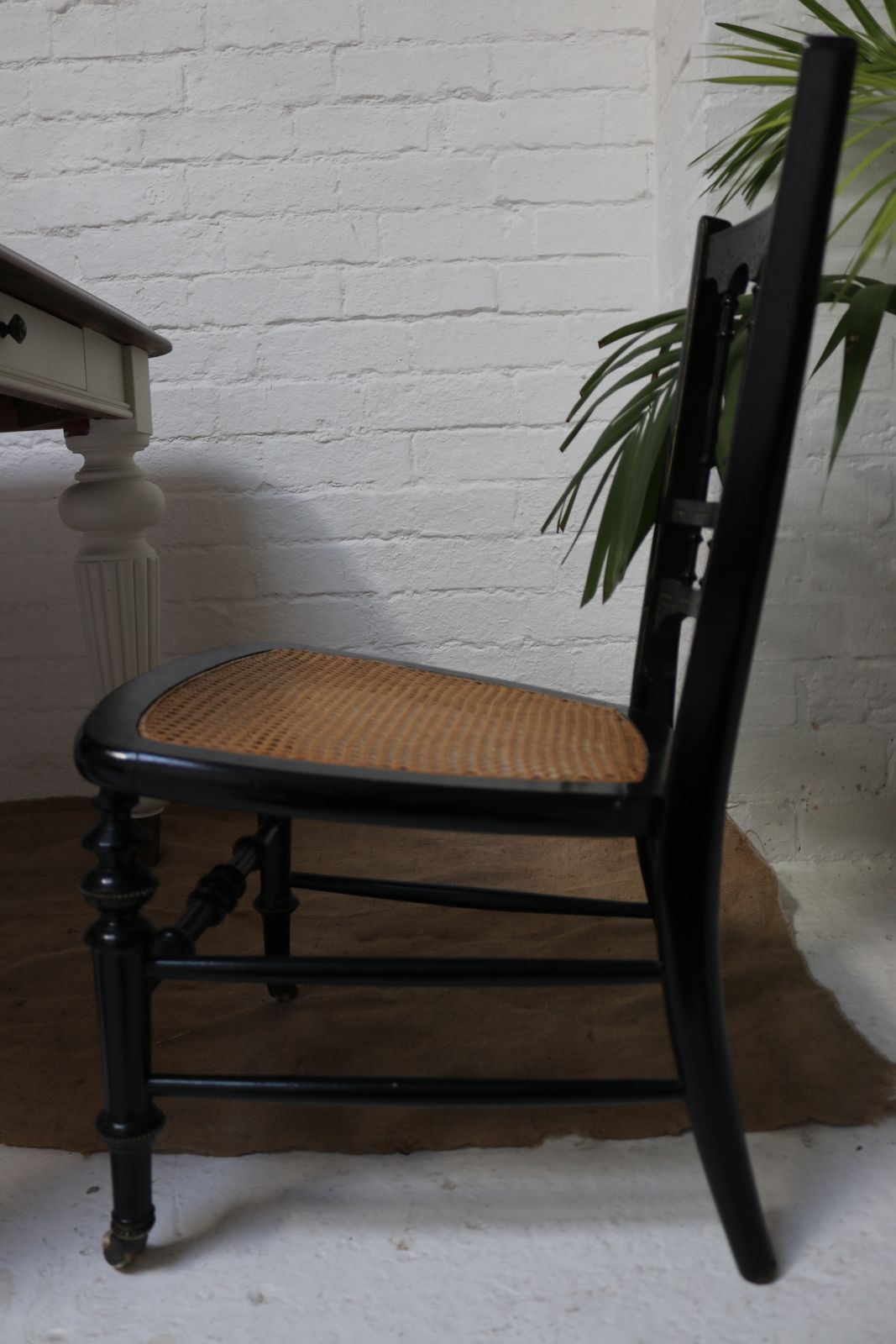 photo for sale Antique Black Rattan Nursing Chair