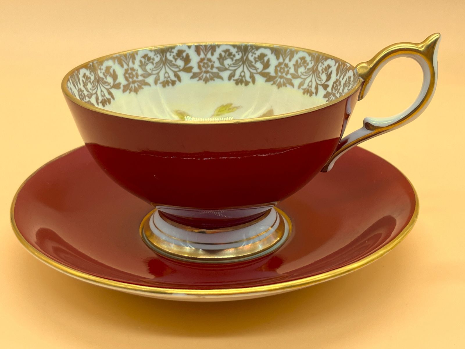 photo furniture Large Aynsley China Cabbage Rose Signed G Bentley Red And Gold Footed Cabinet Tea Cup & Saucer Duo. 2628.