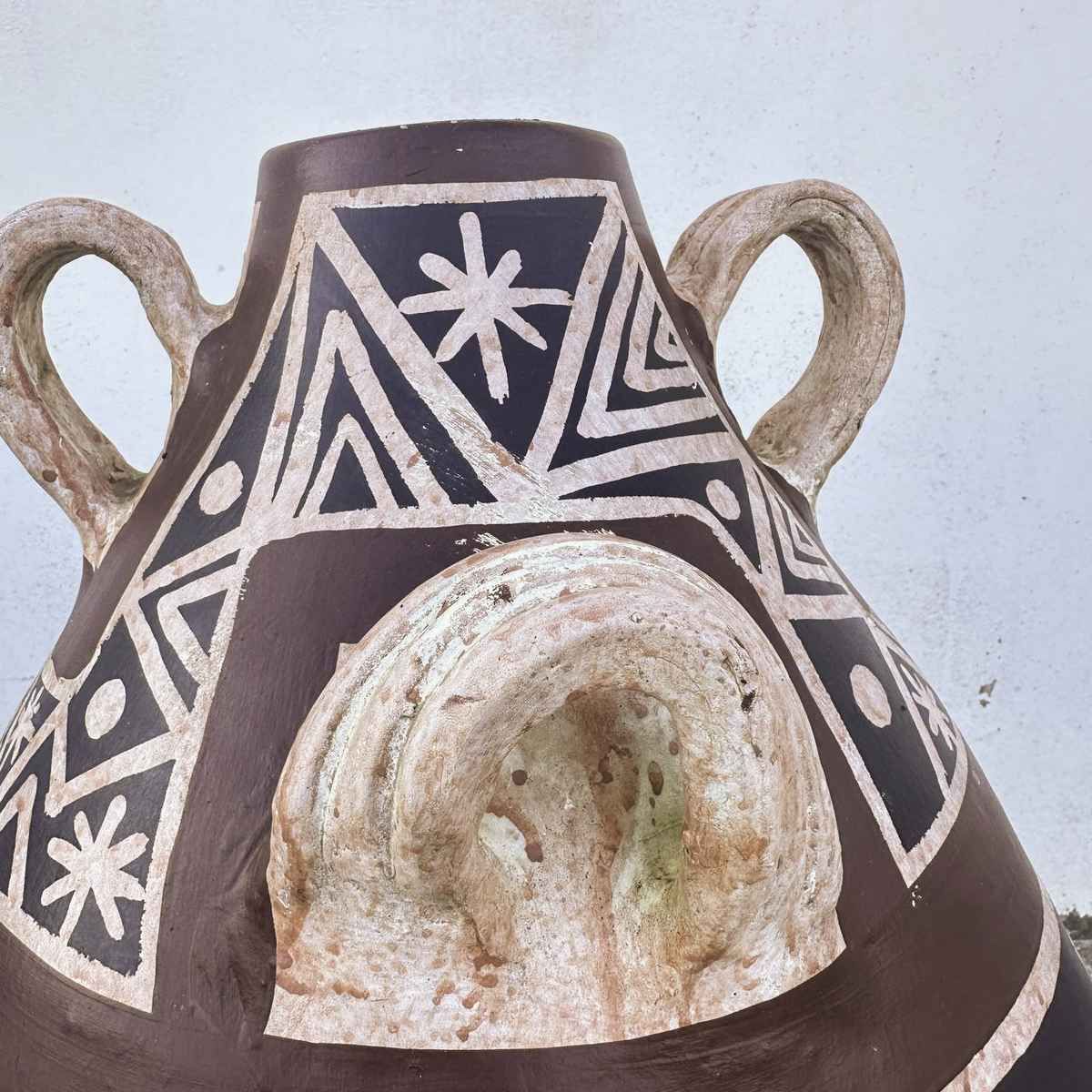 Ceramic Vase Decorated With Ancient Symbols, A Unique Piece That Tells Distant Stories. photo for sale
