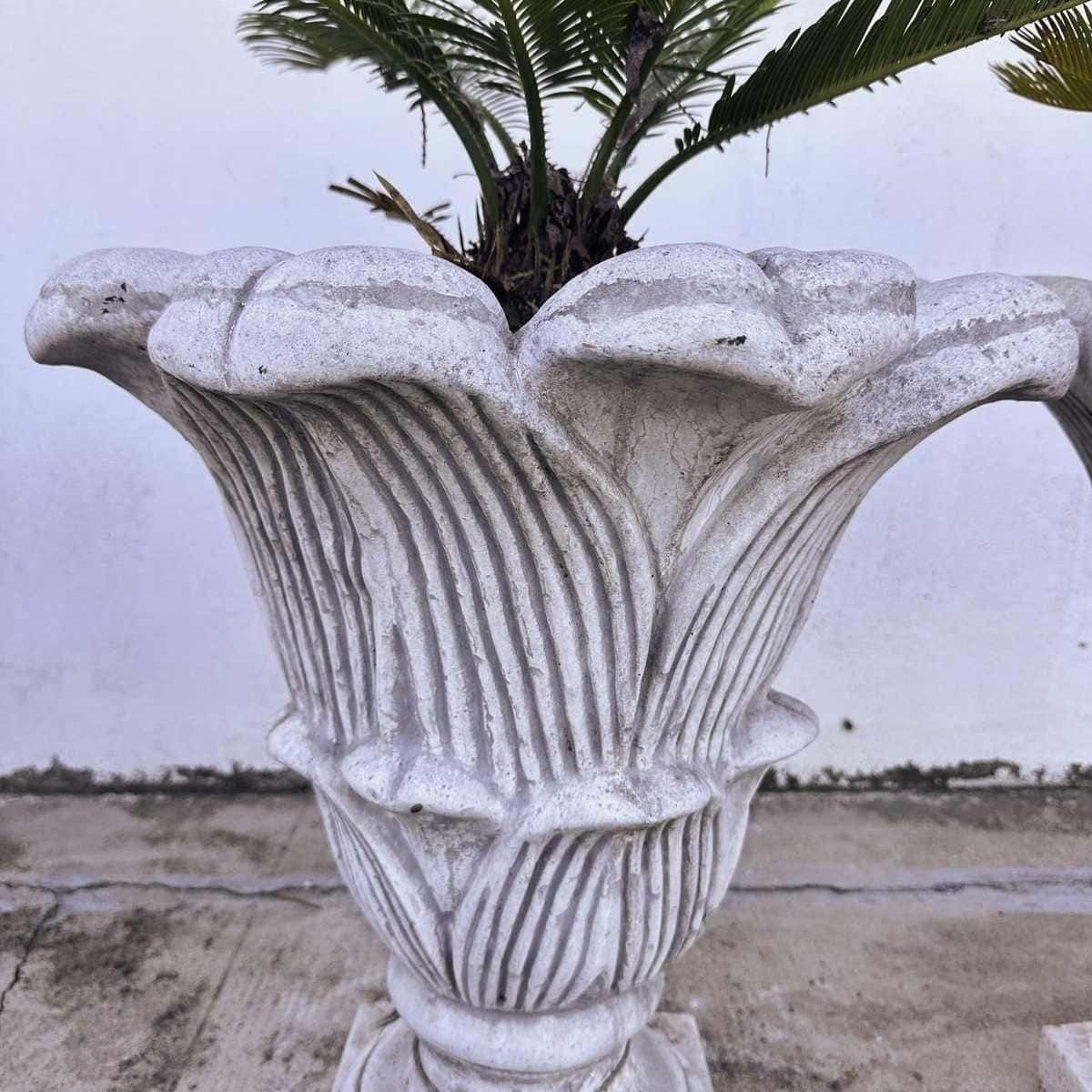Twin Planters With Intricate Detailing, Perfect For Creating Symmetry And Beauty In The Garden. photo furniture