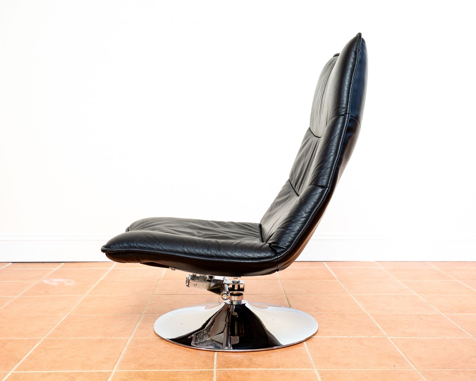 1650.0 Black Italian Leather Lounge Chair And Footstool Swivel Tilt Chrome Retro Vintag.E Easy Chair Space Age Mcm 1970s Style photo