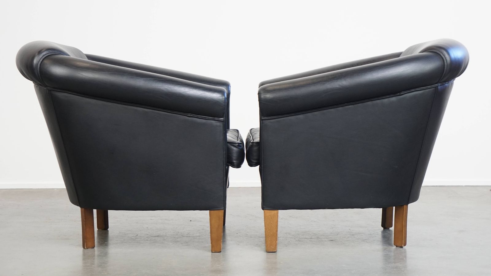 Beautiful Set Of 2 Black English Style Cowhide Club Chairs With A Timeless Design photo furniture