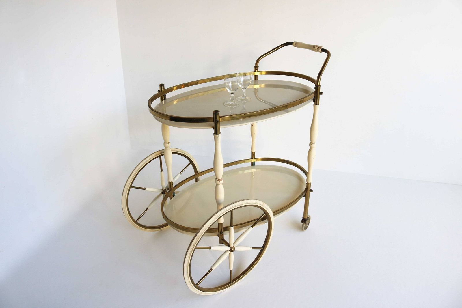 Hollywood Regency Shabby Chic Cream Lacquer Gold Oval Mid Century Wedding Bar Cart Neoclassical Serving Table Trolley Brass Glass Tea 1960s photo furniture