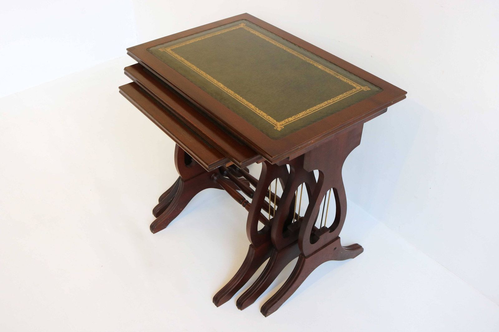 Mid Century Wooden Nesting Tables With Green Leather Tops Harp Shaped Legs Set Of Three Sides Tables Antique Style Nest Of Tables Mimiset 70 photo 831.0