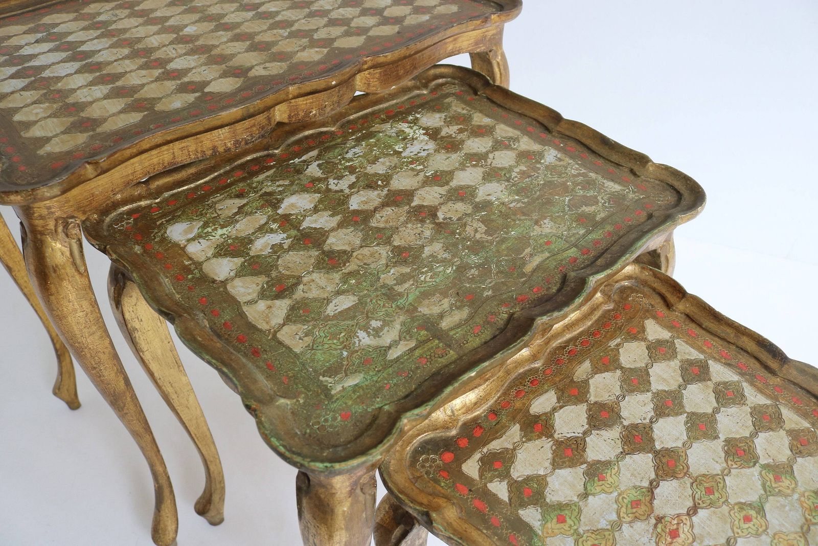 Graceful Set Of Three Italian Florentine Gold Hollywood Regency Wood Stacking Nesting Tables Additional Tables Side Tables Set Tables 1960s photo vintage